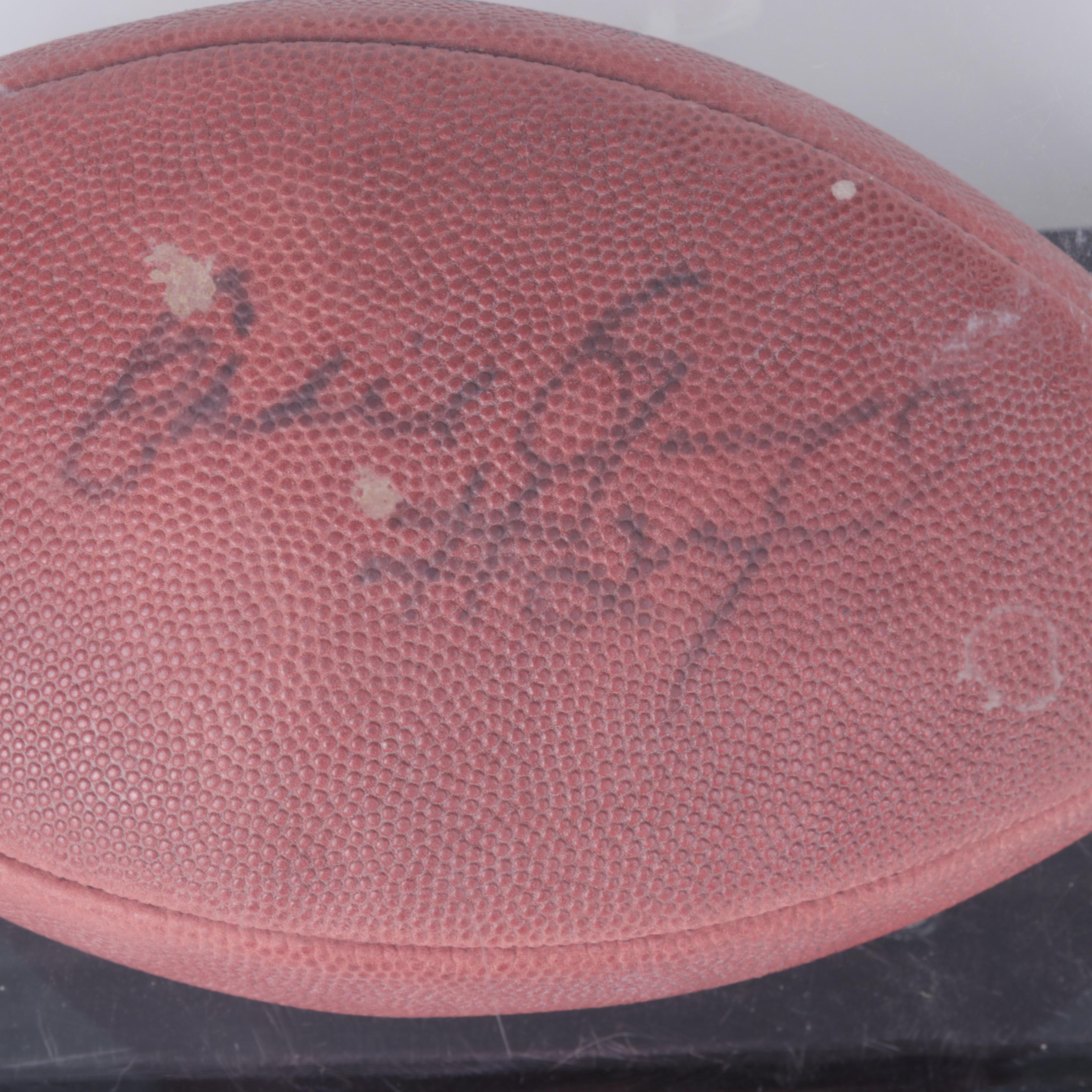 Eddie George Signed Wilson Football In Case and 2012 Urban Meyer Signed T-Shirt