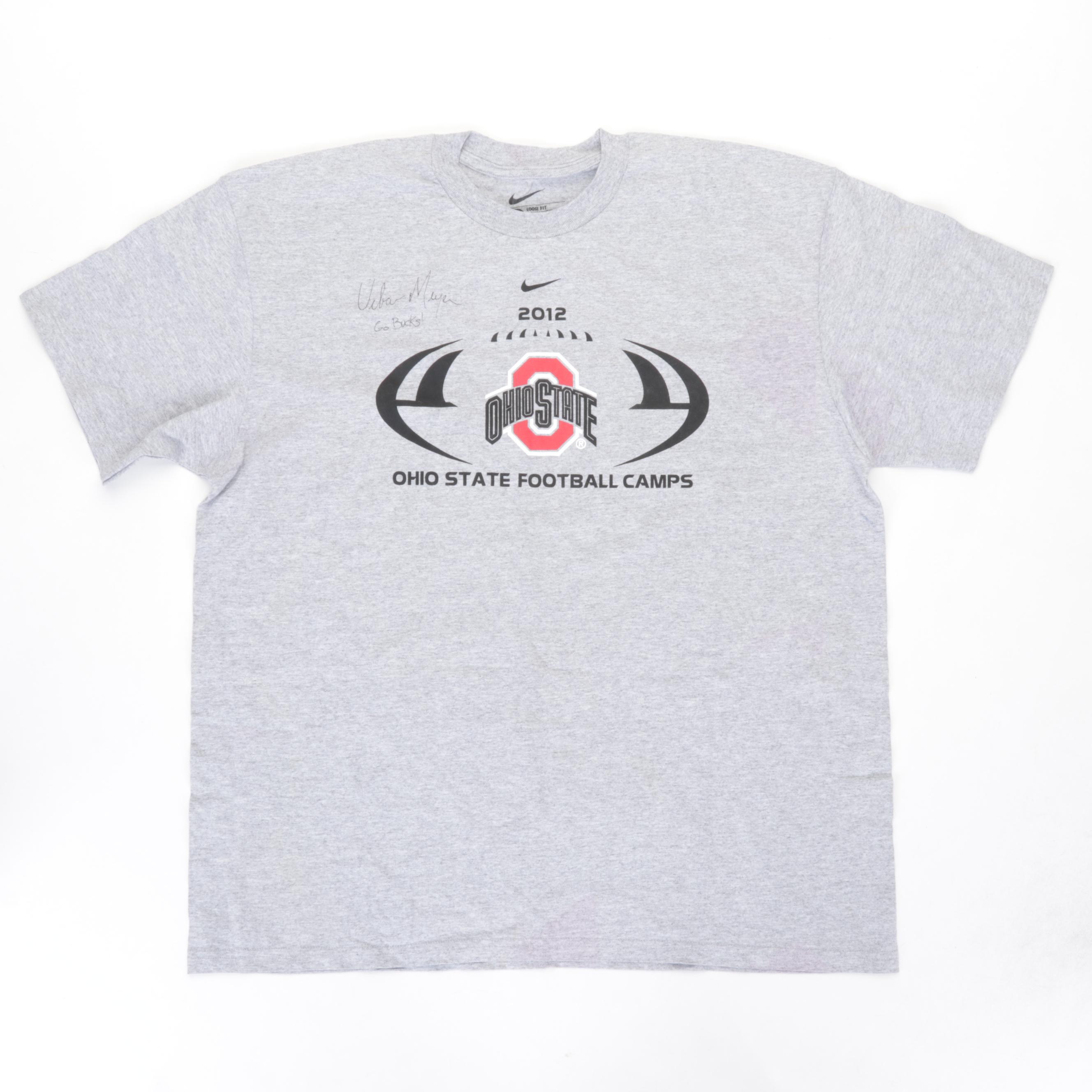 Eddie George Signed Wilson Football In Case and 2012 Urban Meyer Signed T-Shirt