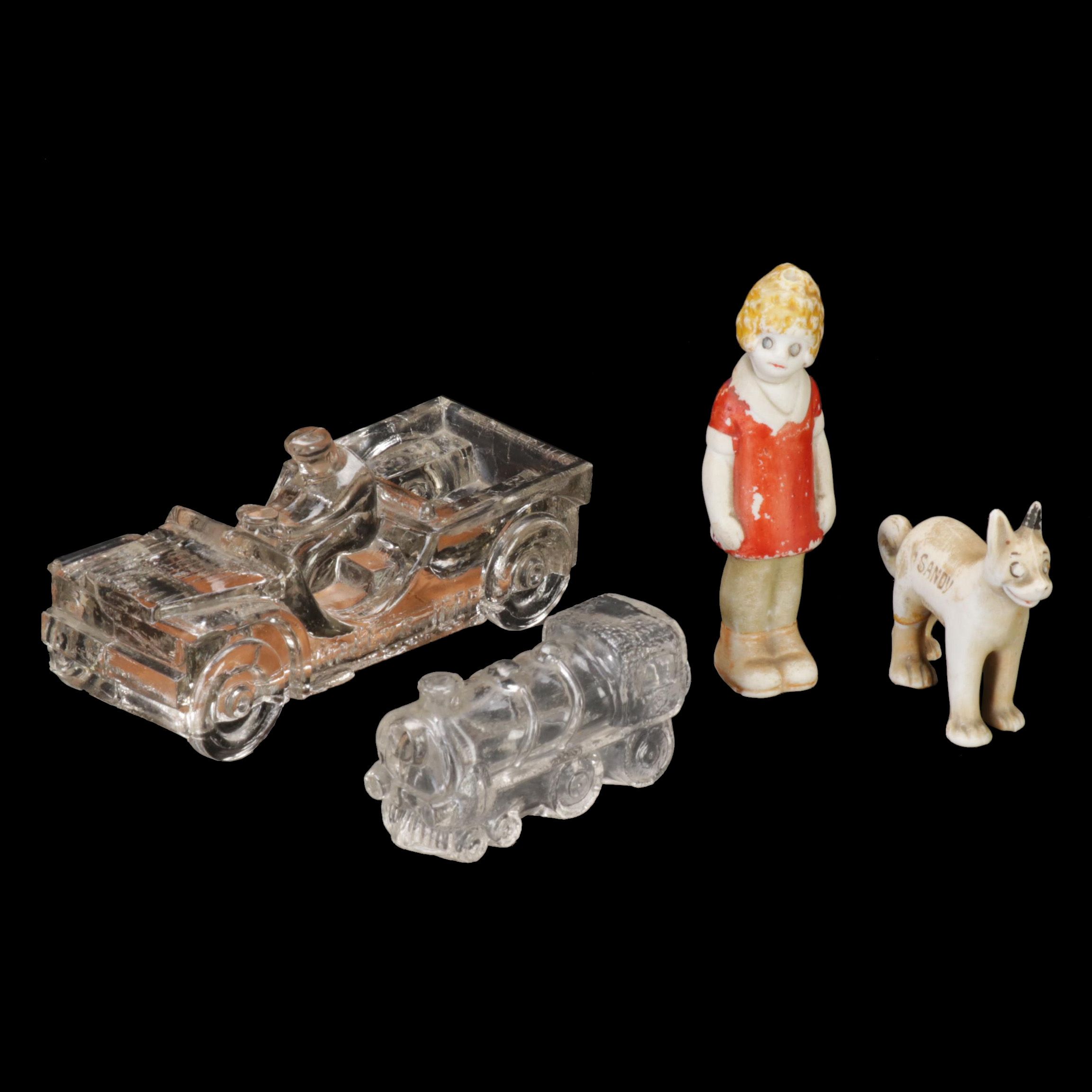 Bisque "Little Orphan Annie" Figures and Glass Candy Boxes, Early 20th Century