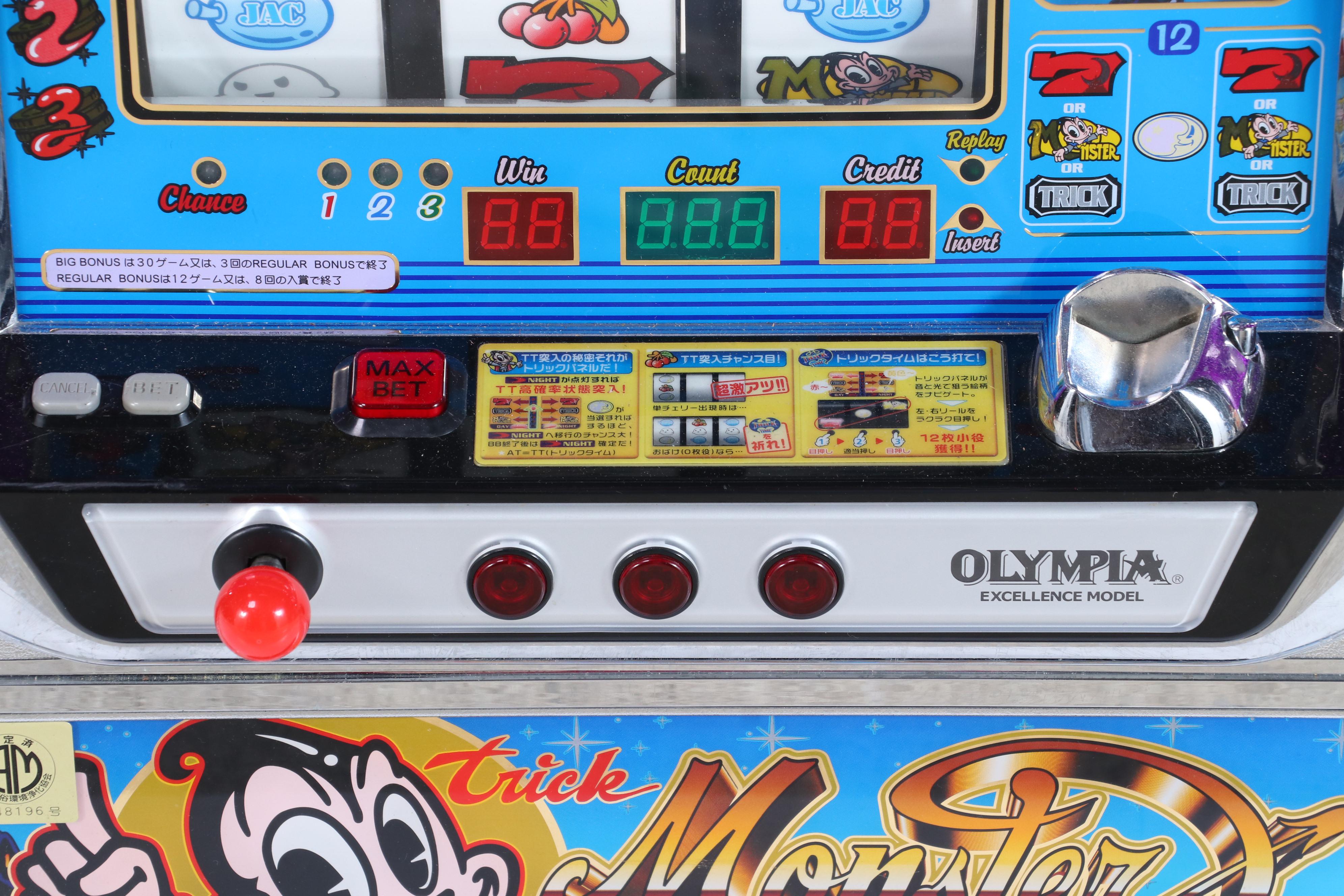 Olympia Excellence Model "Trick Monster" Slot Machine with Tokens