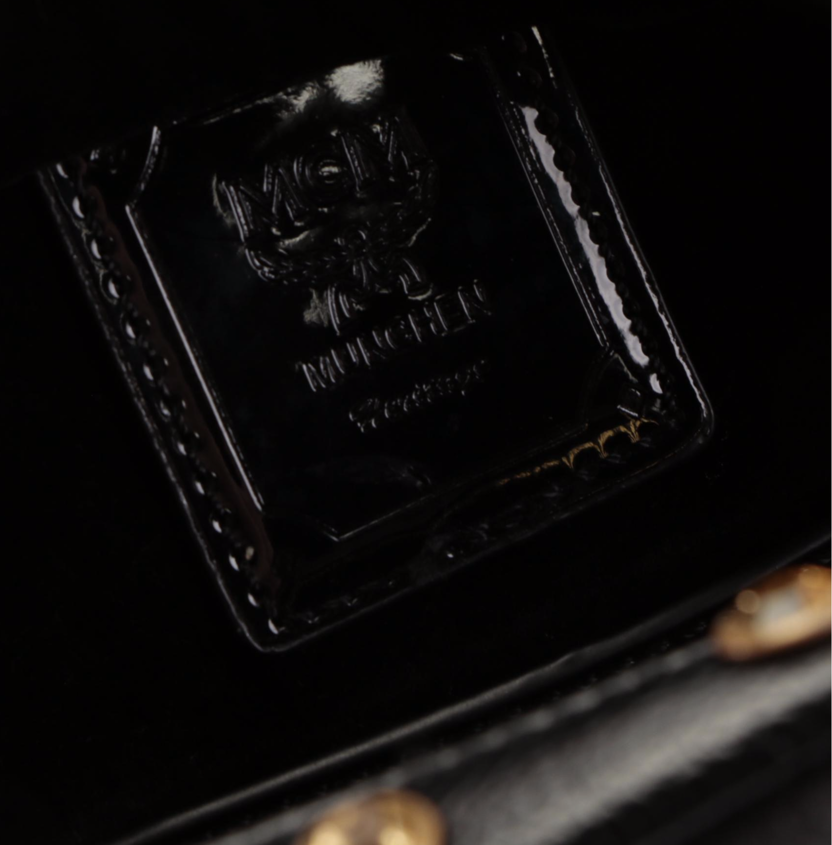 MCM Stark Kristal X-Mini Backpack in Black Embellished Leather