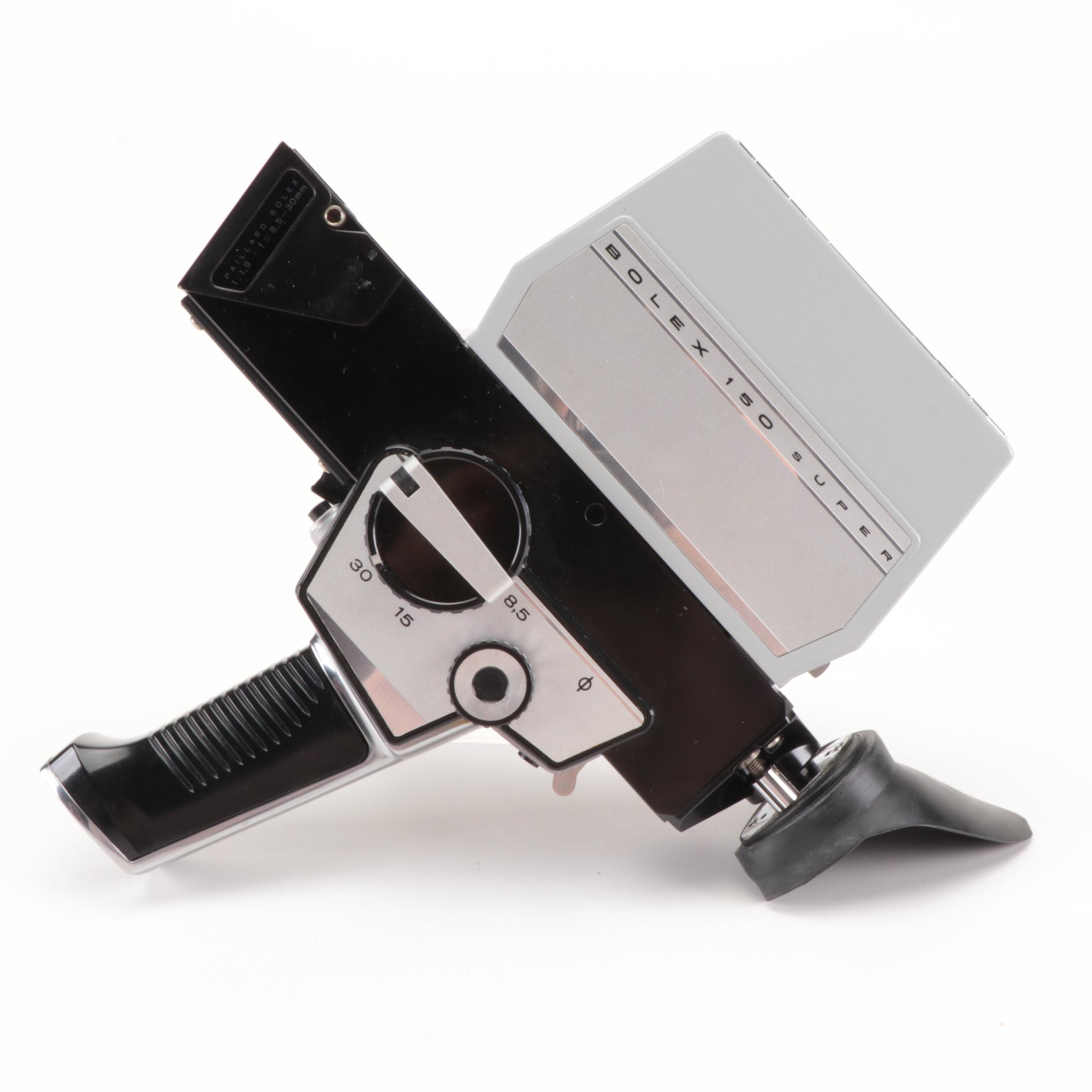 Bolex Paillard with Bell Howell Movie Cameras and Polaroid "95A" Land Camera