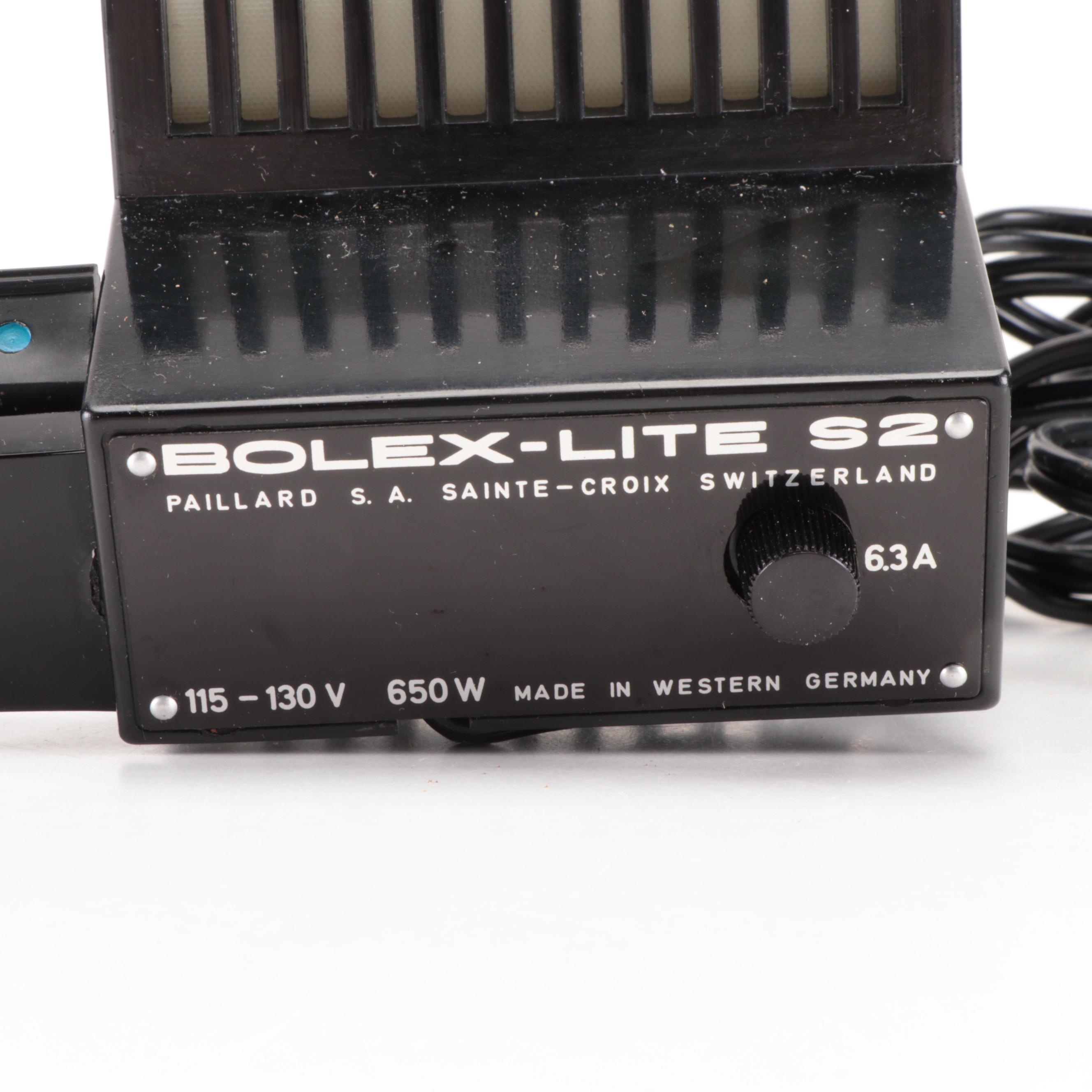 Bolex Paillard with Bell Howell Movie Cameras and Polaroid "95A" Land Camera