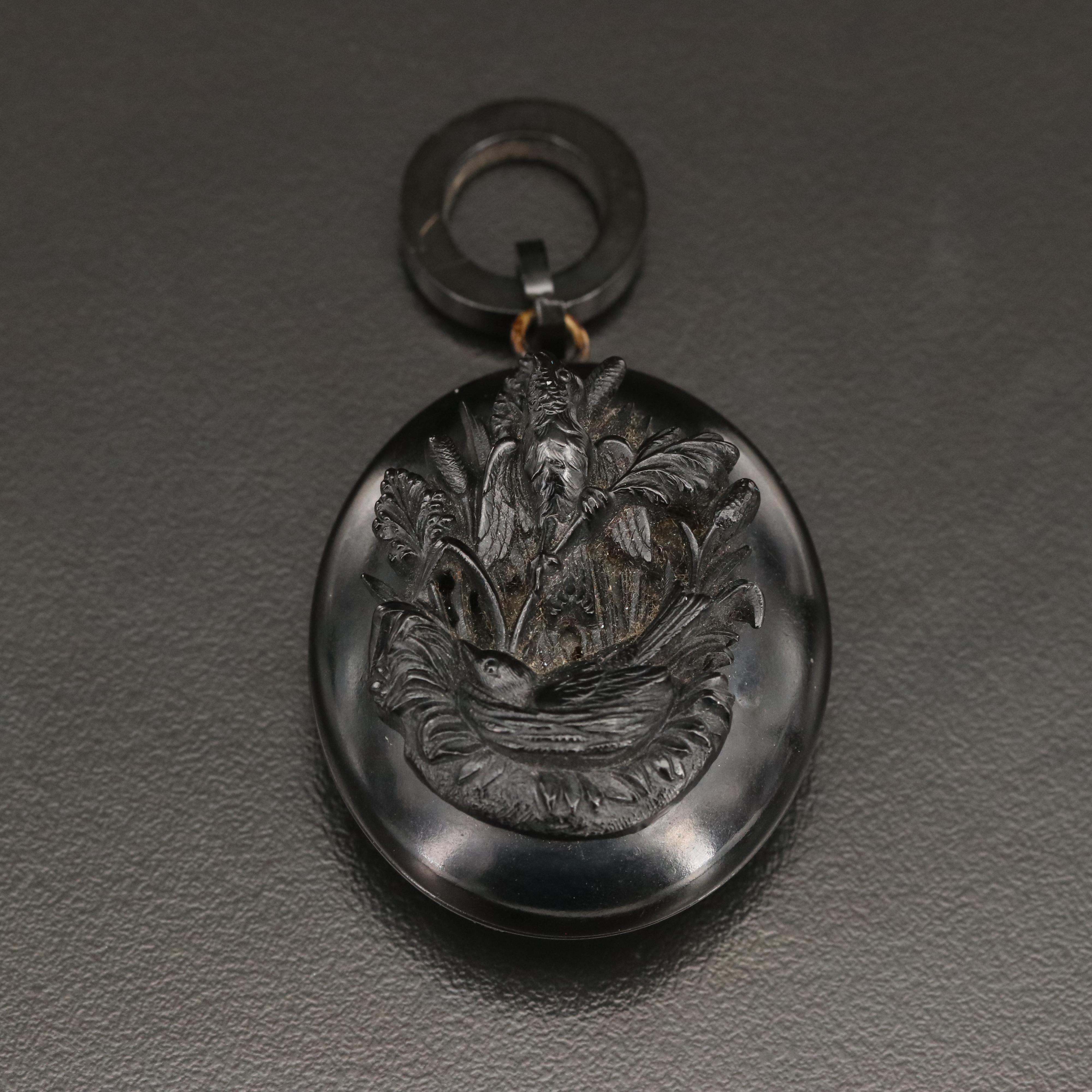 Mid-Victorian High Relief Carved Jet Mourning Locket with Swallows