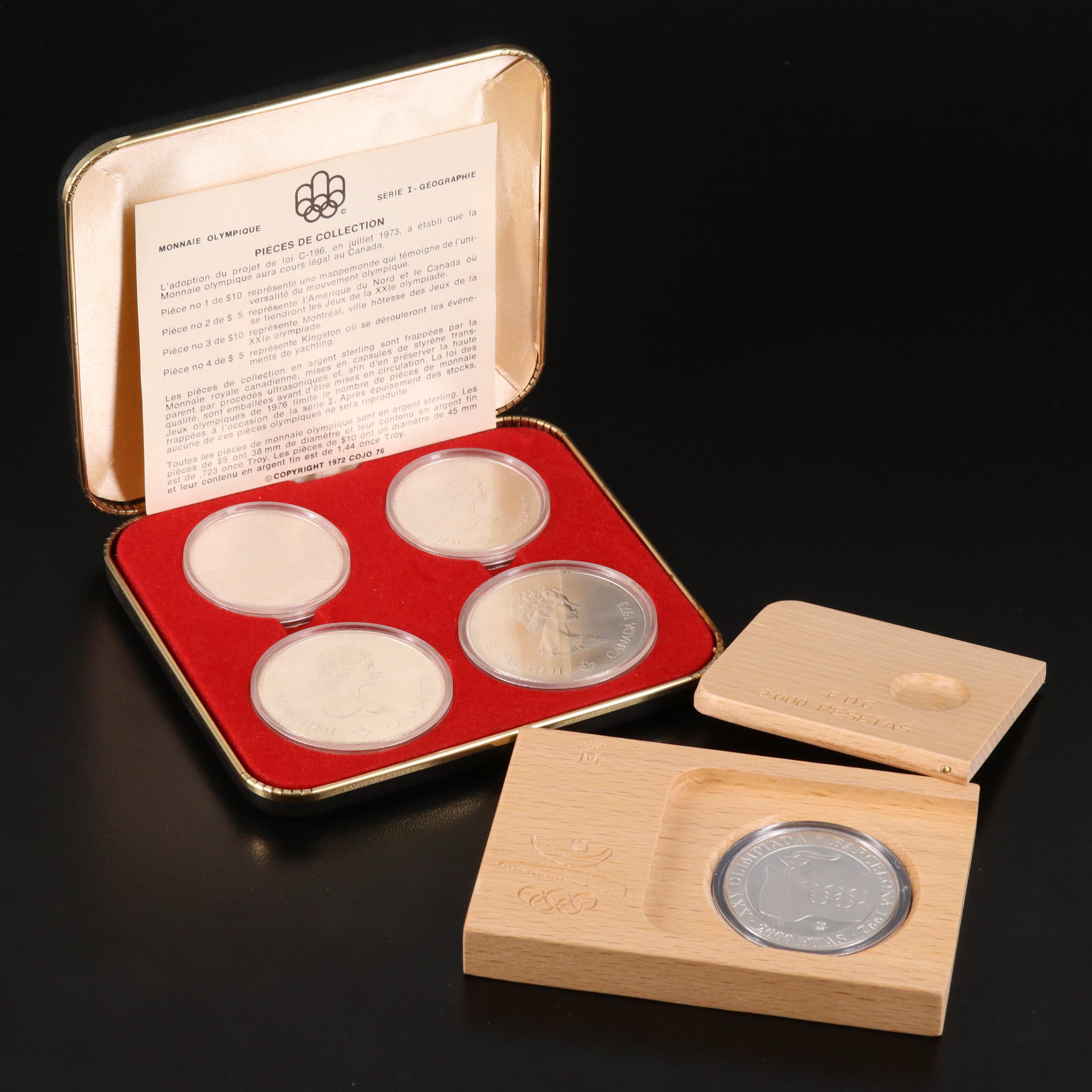 1973 Canada Silver Olympics Four-Coin Set and 1972 Spain 2000 Pesetas Proof Coin