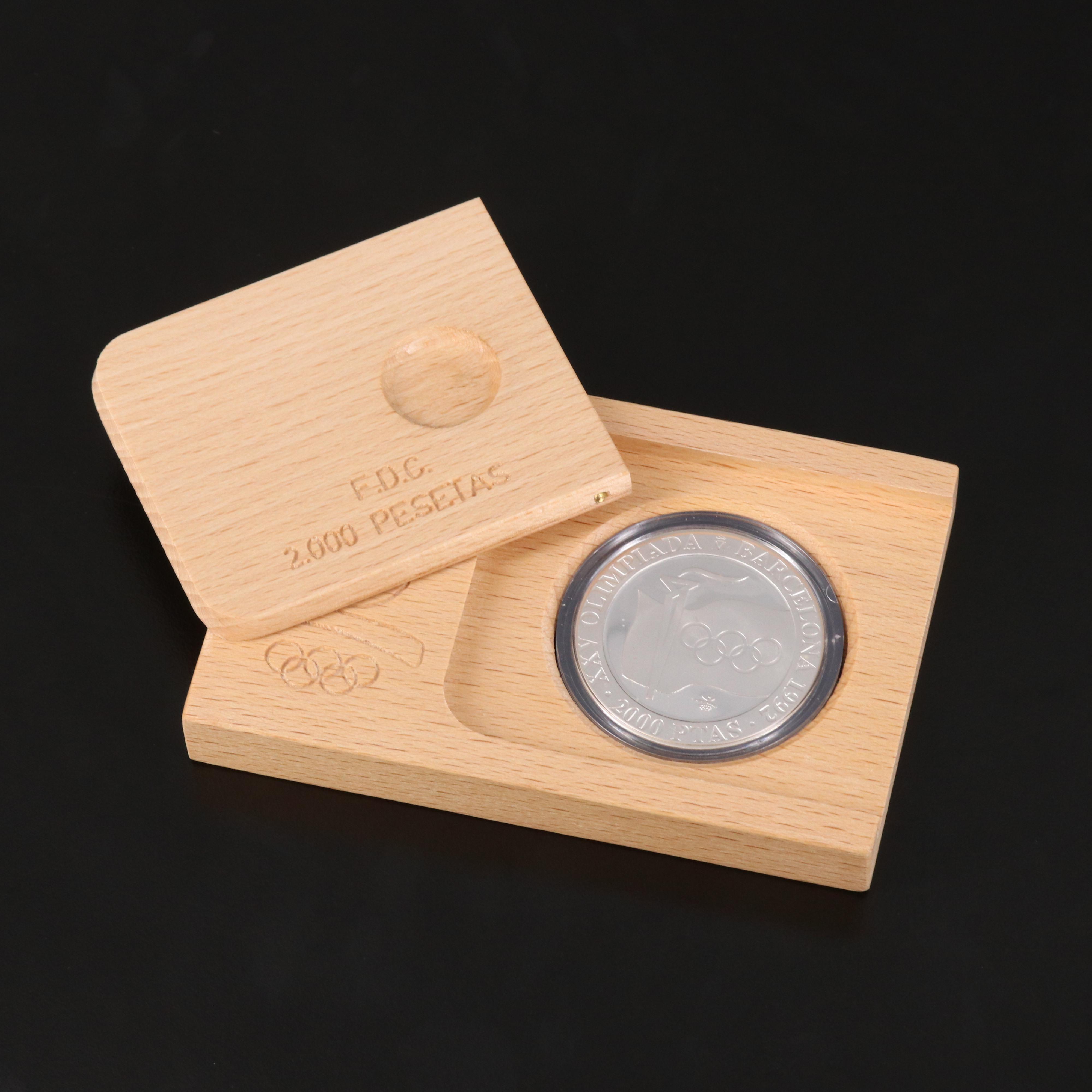 1973 Canada Silver Olympics Four-Coin Set and 1972 Spain 2000 Pesetas Proof Coin