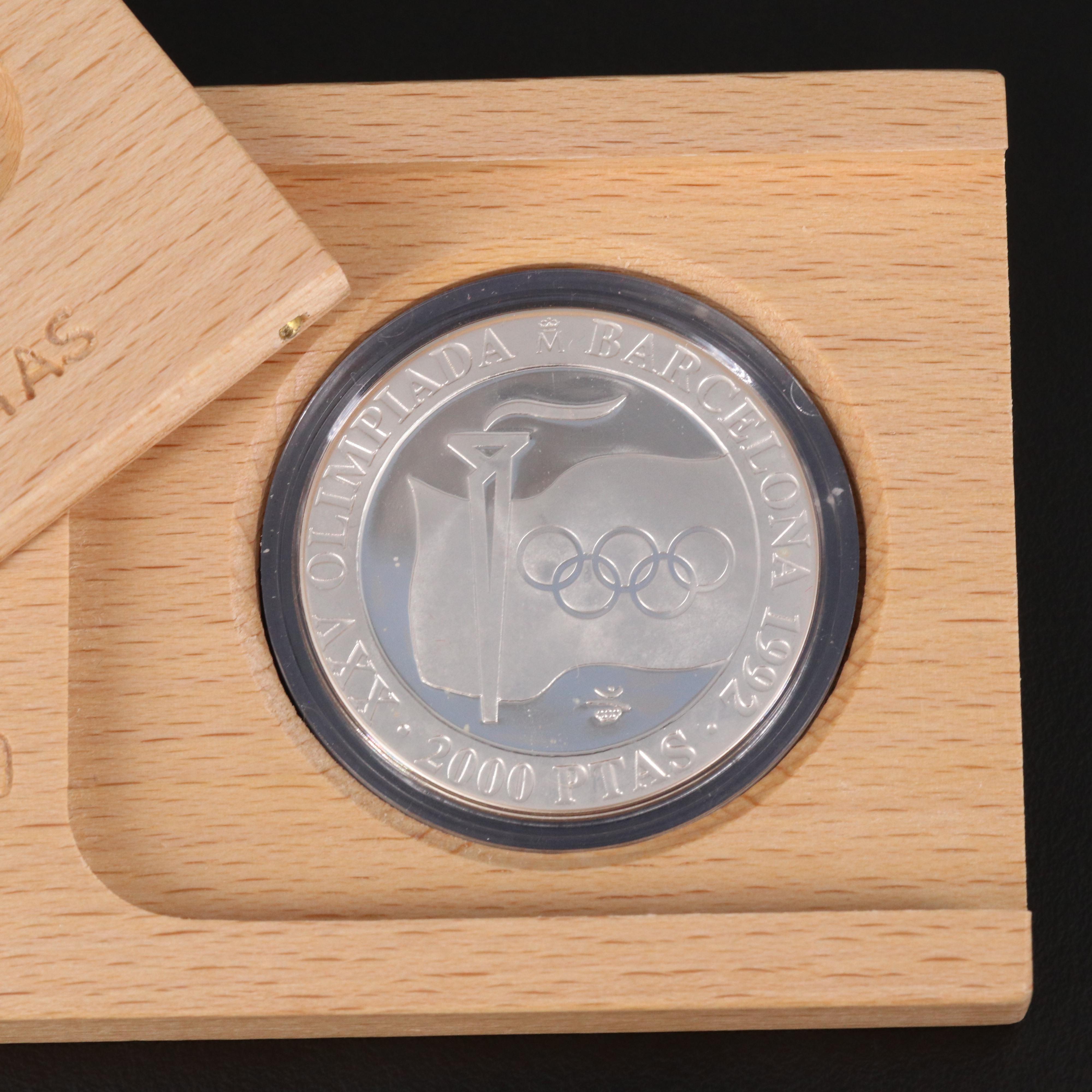 1973 Canada Silver Olympics Four-Coin Set and 1972 Spain 2000 Pesetas Proof Coin