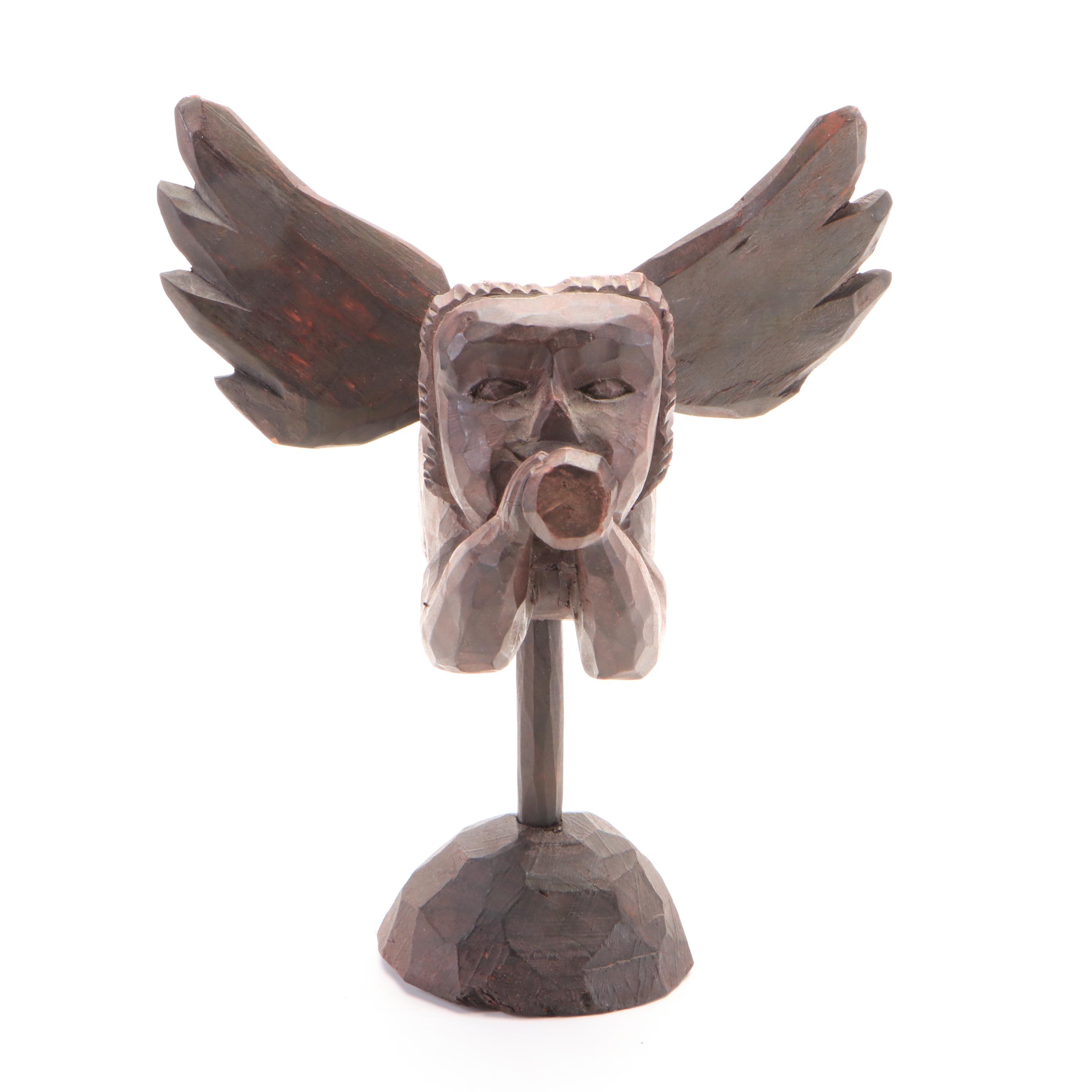 Oval Wall Clock with Cast Metal Brackets and Wooden Decor