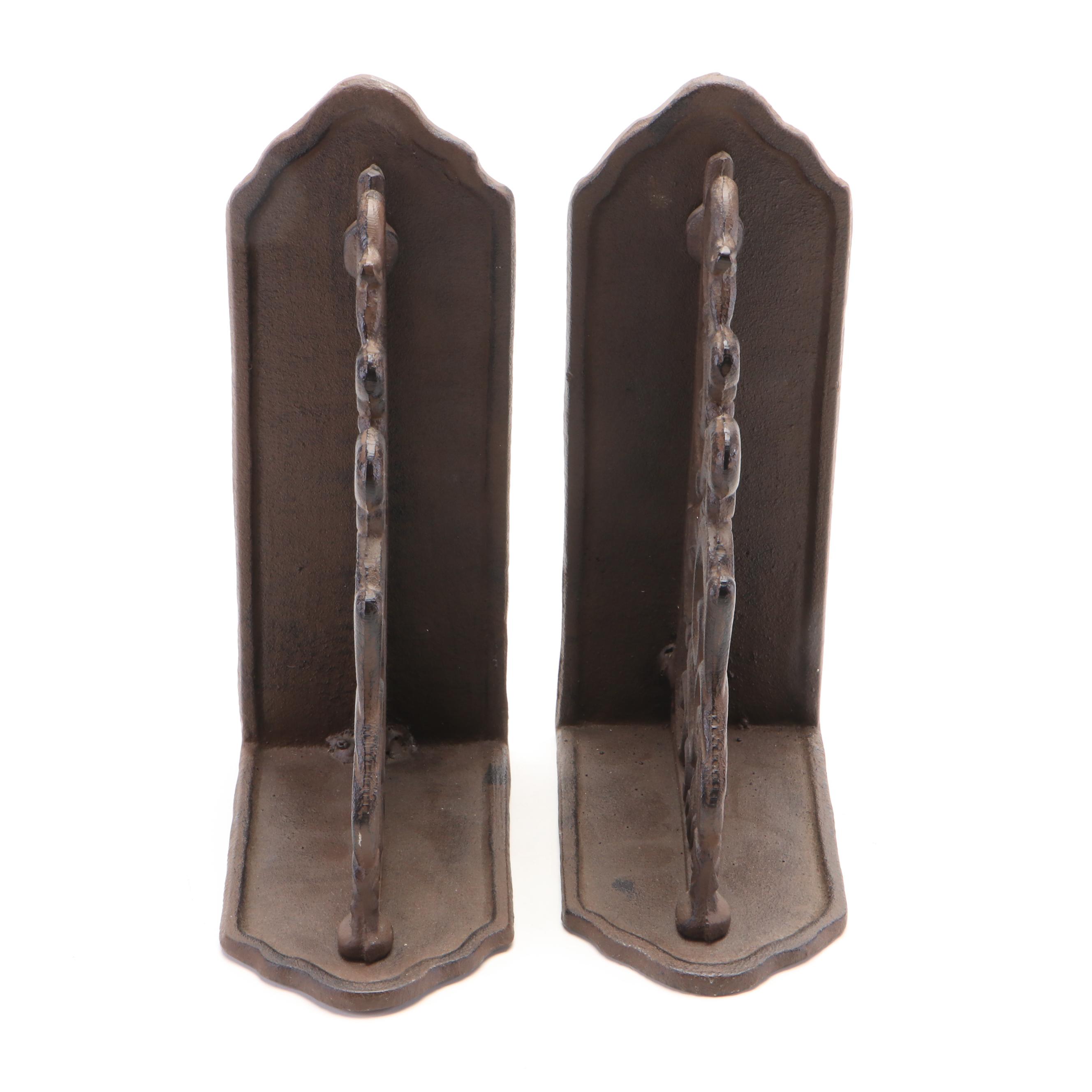 Oval Wall Clock with Cast Metal Brackets and Wooden Decor