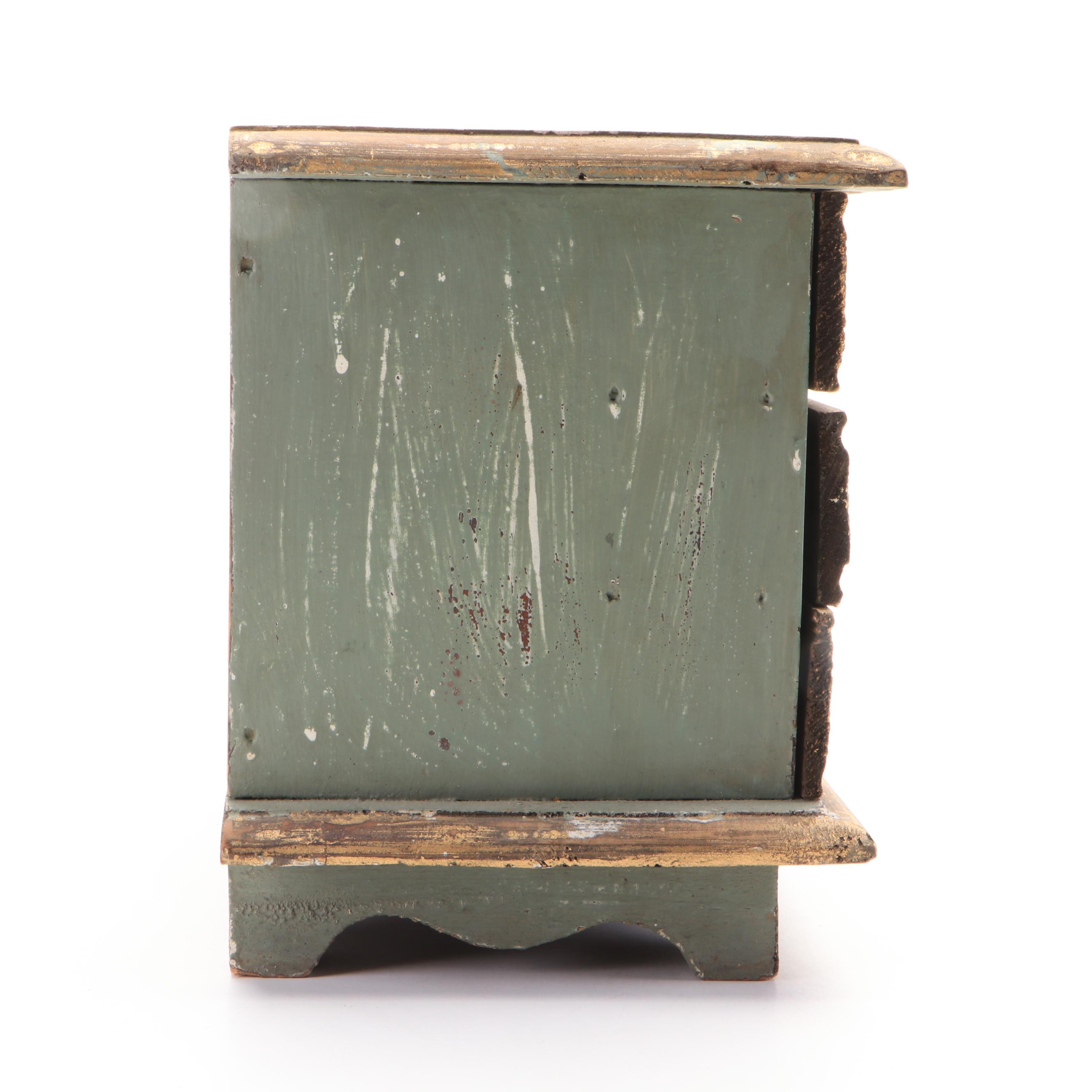 Oval Wall Clock with Cast Metal Brackets and Wooden Decor