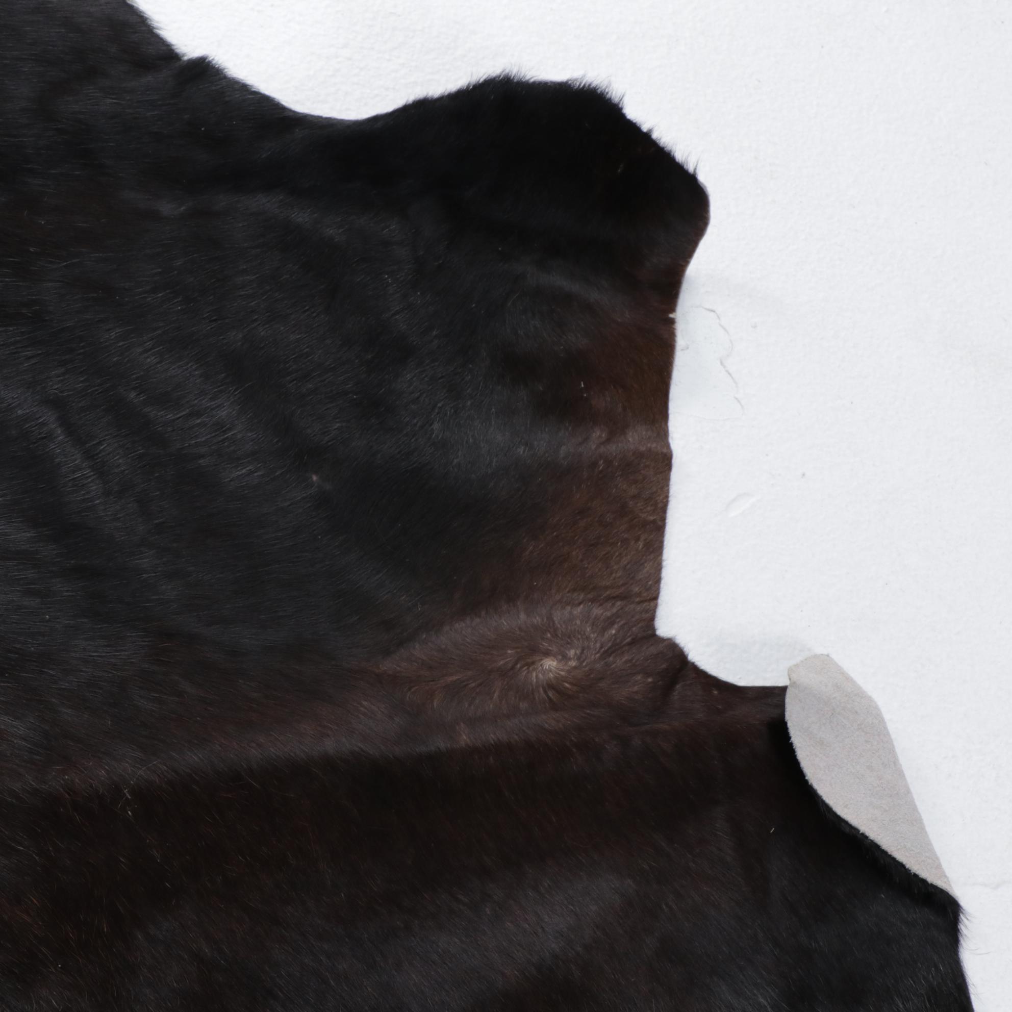 6'7 x 8'1 IKEA Cowhide Area Rug with Brand Marks