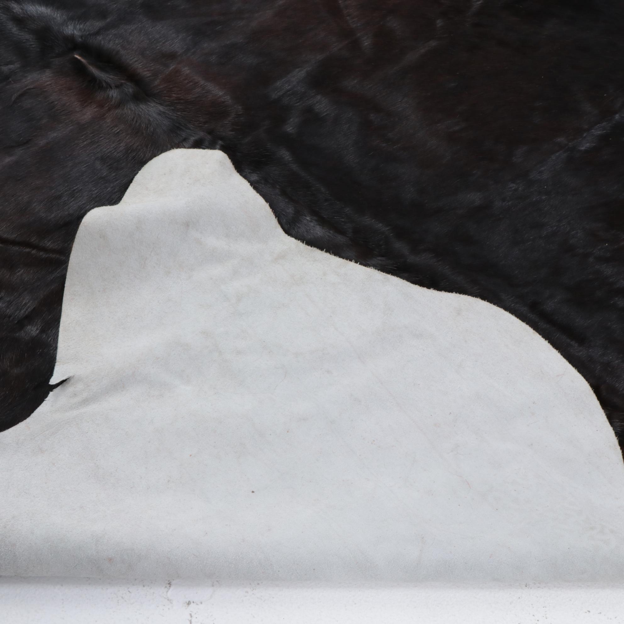 6'7 x 8'1 IKEA Cowhide Area Rug with Brand Marks