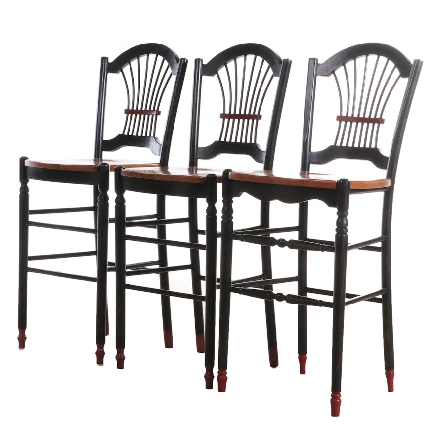 Three Parcel-Ebonized and Polychromed Beech Bar Stools