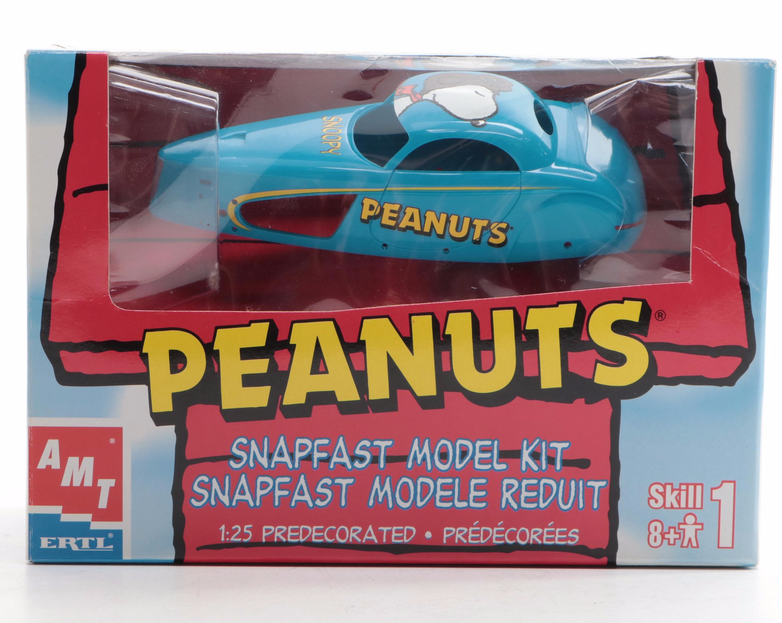 Deb Canham Handmade "Flying Ace" Snoopy Figurine with Other Peanuts Memorabilia