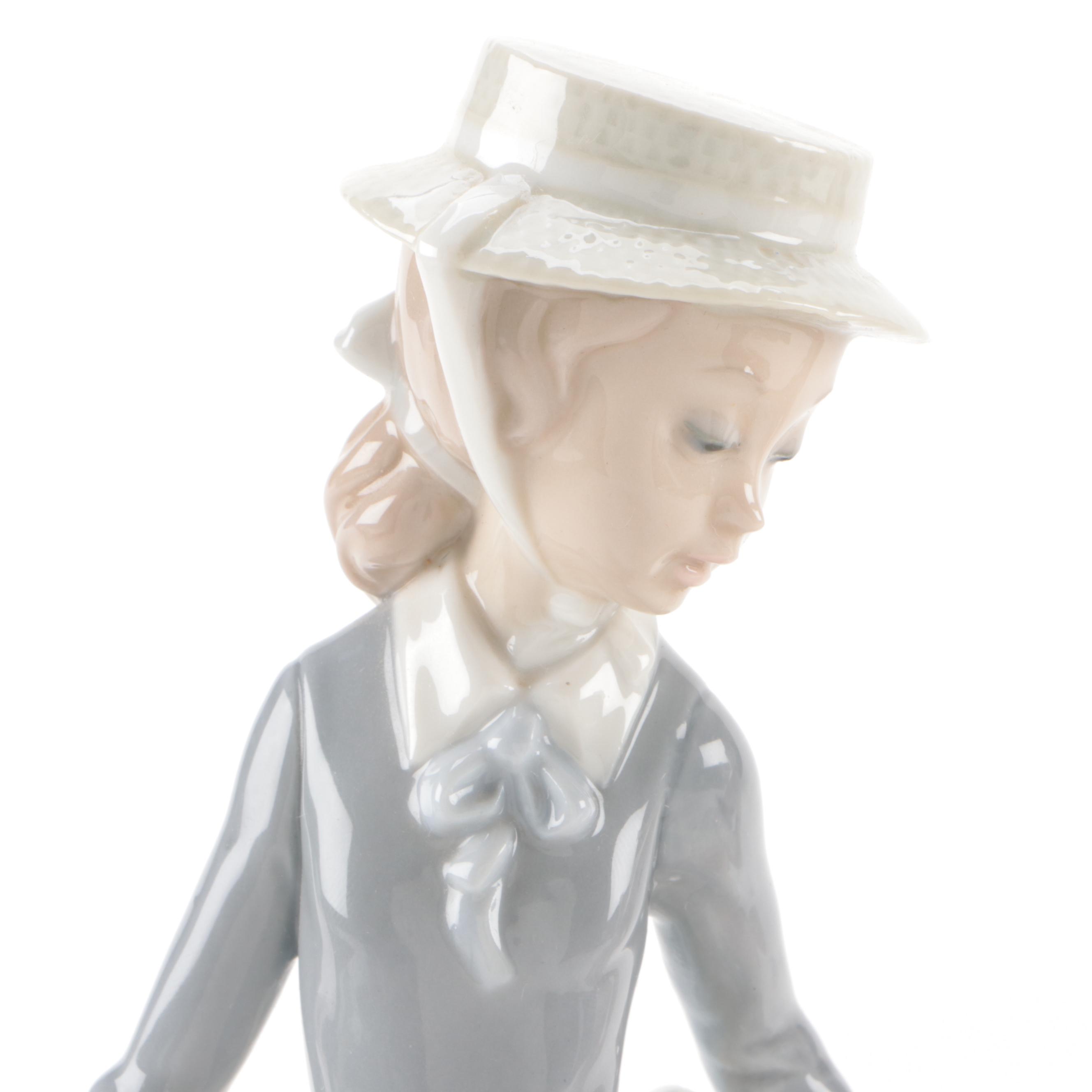 Lladró "Young Lady in Trouble" and "Girl with Straw Hat" Porcelain Figurines