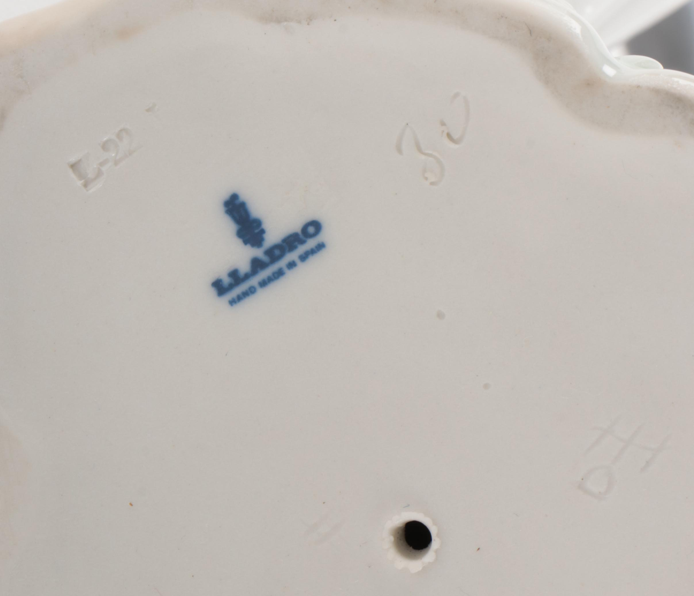 Lladró "Young Lady in Trouble" and "Girl with Straw Hat" Porcelain Figurines