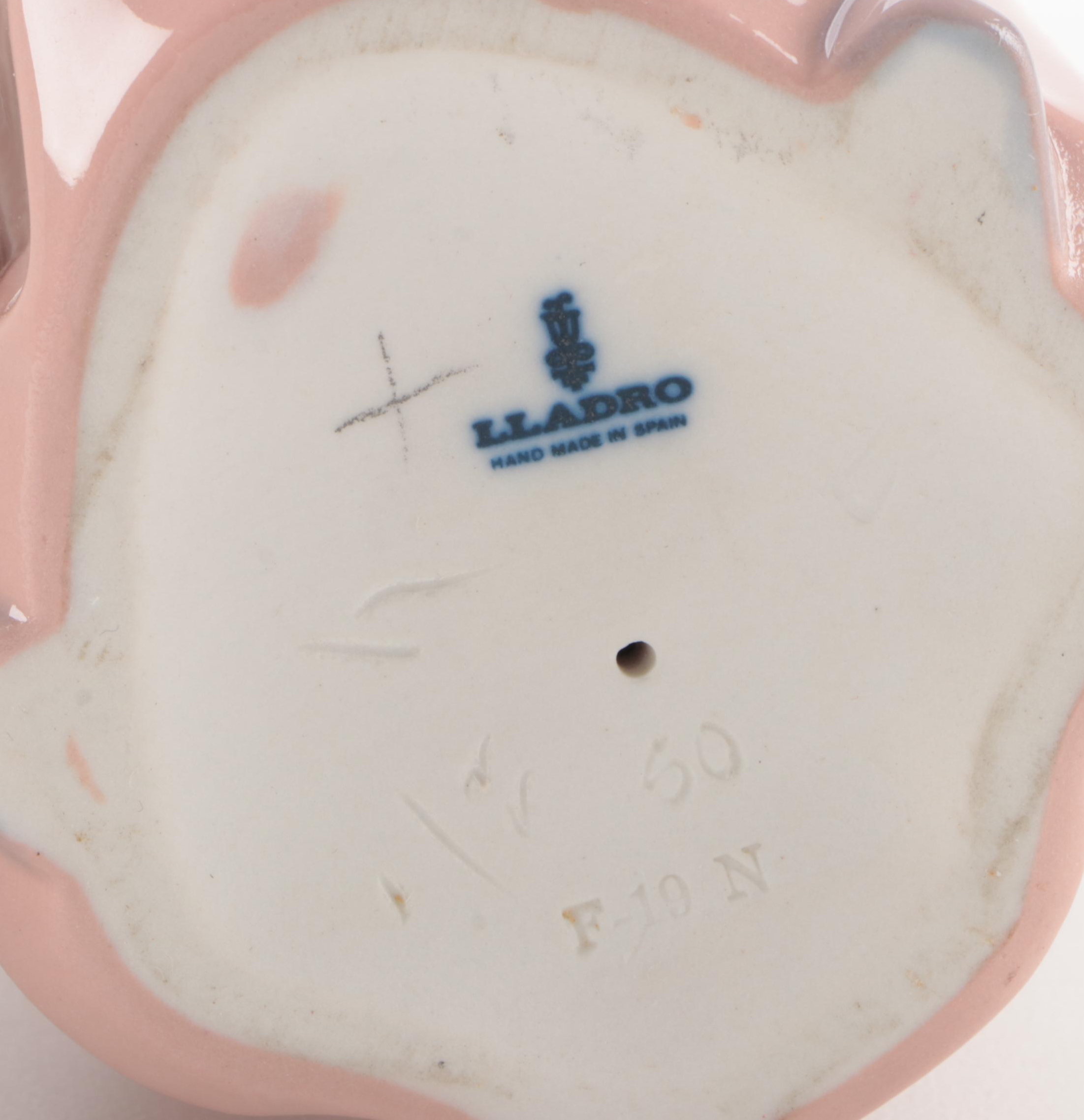 Lladró "Young Lady in Trouble" and "Girl with Straw Hat" Porcelain Figurines