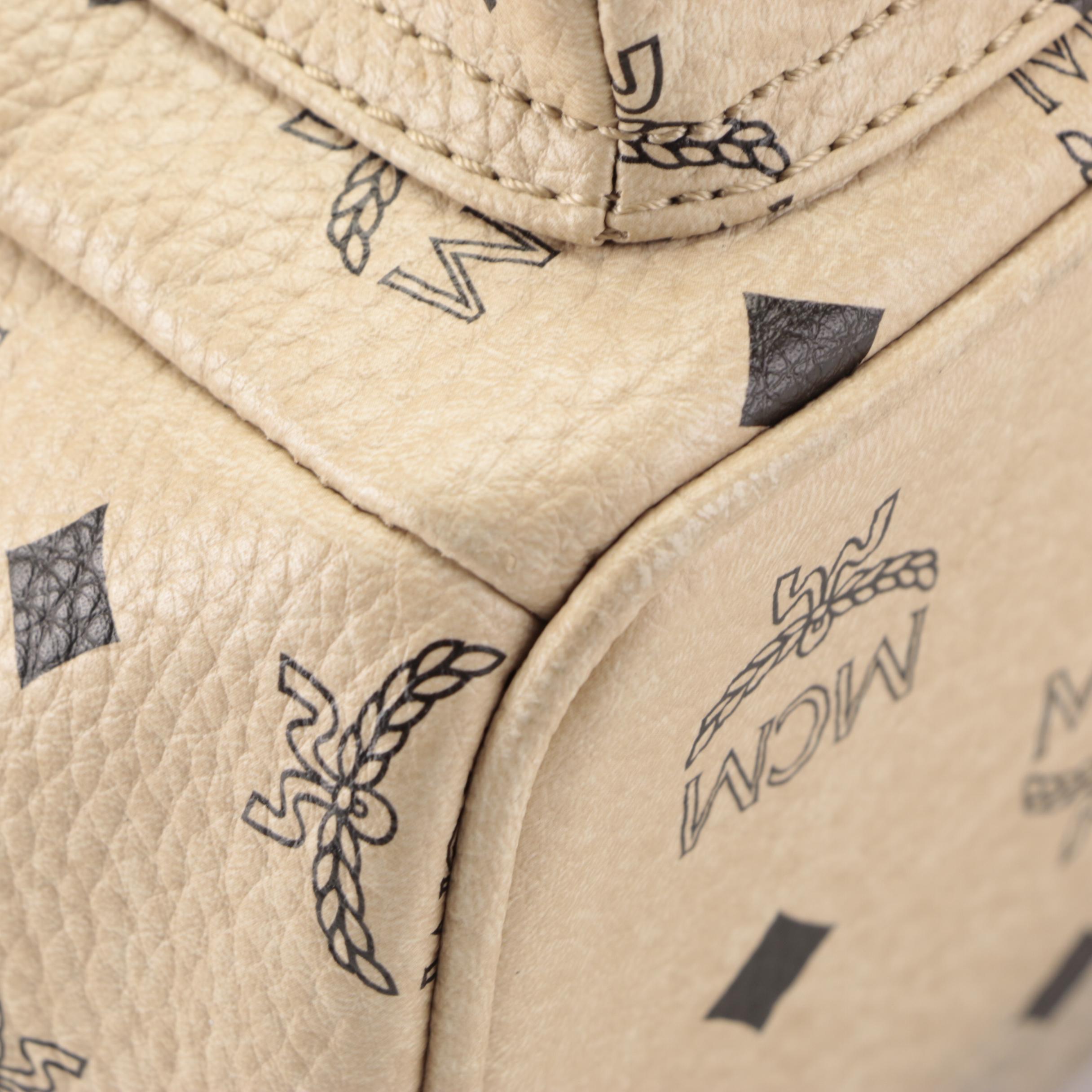 MCM Small Stark Backpack in Studded Beige Visetos Monogram Canvas and Leather