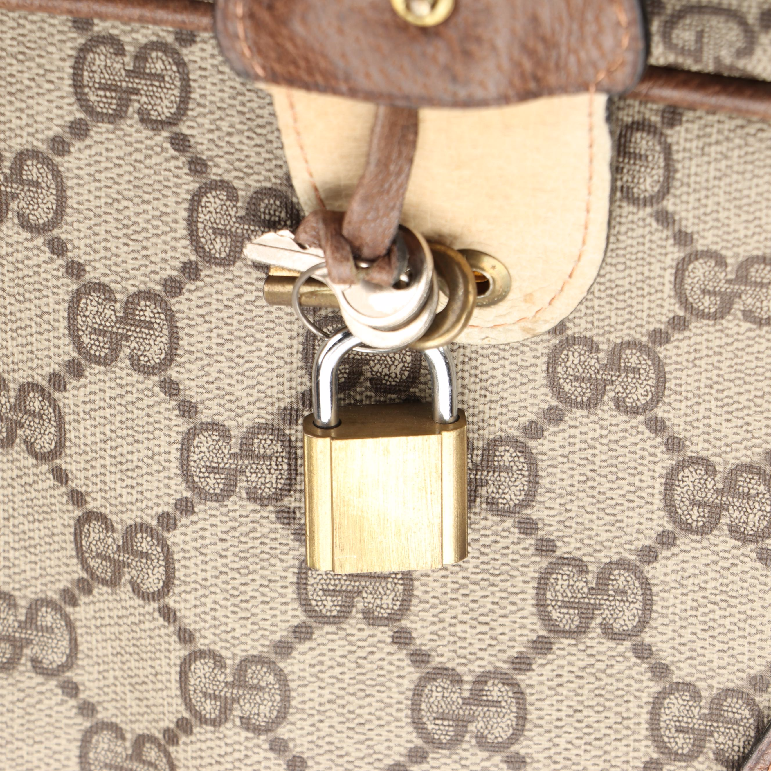 Gucci Soft-Sided Luggage in GG Supreme Canvas and Cinghiale Leather Trim