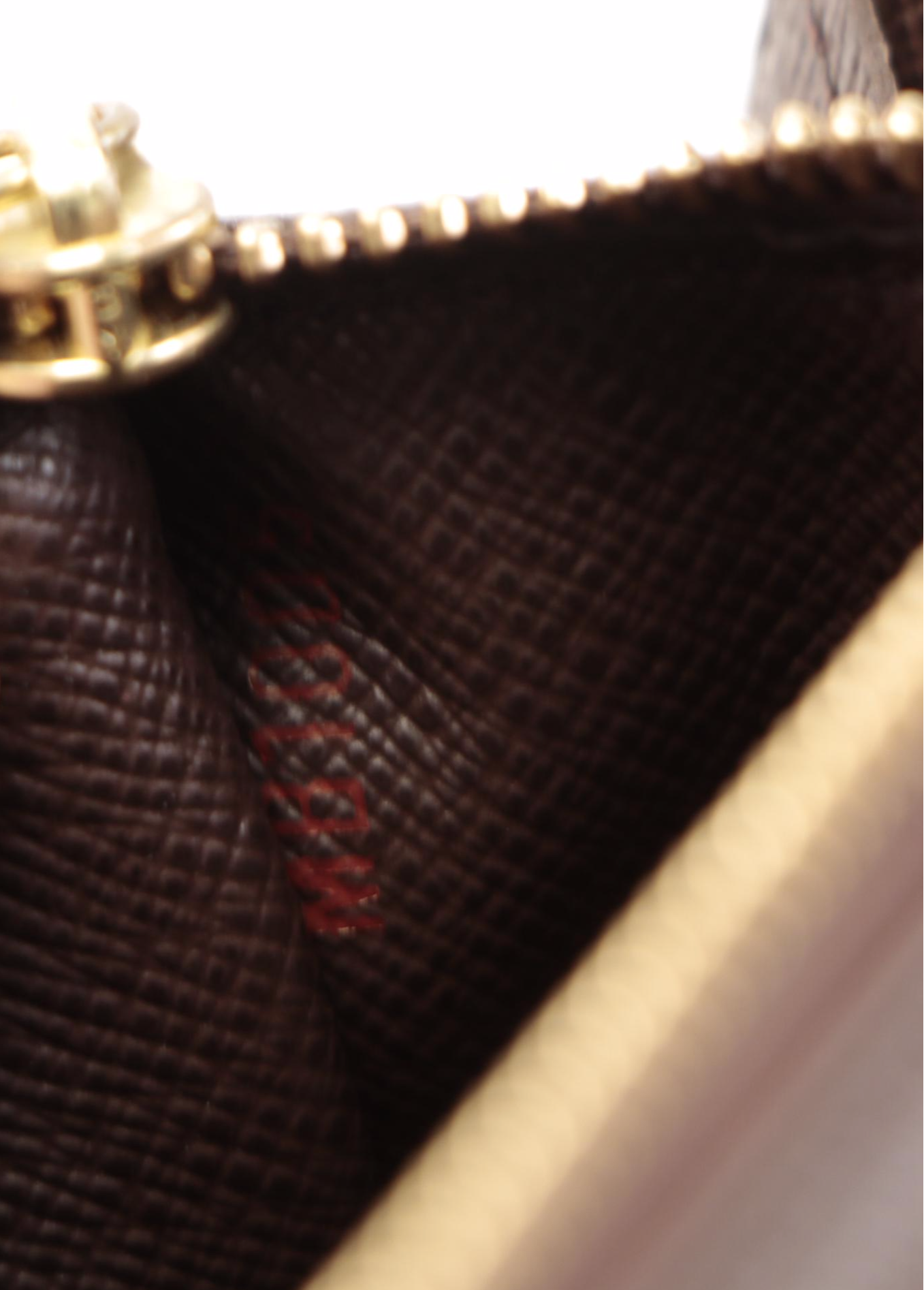 Louis Vuitton Sarah Wallet in Damier Ebene Canvas