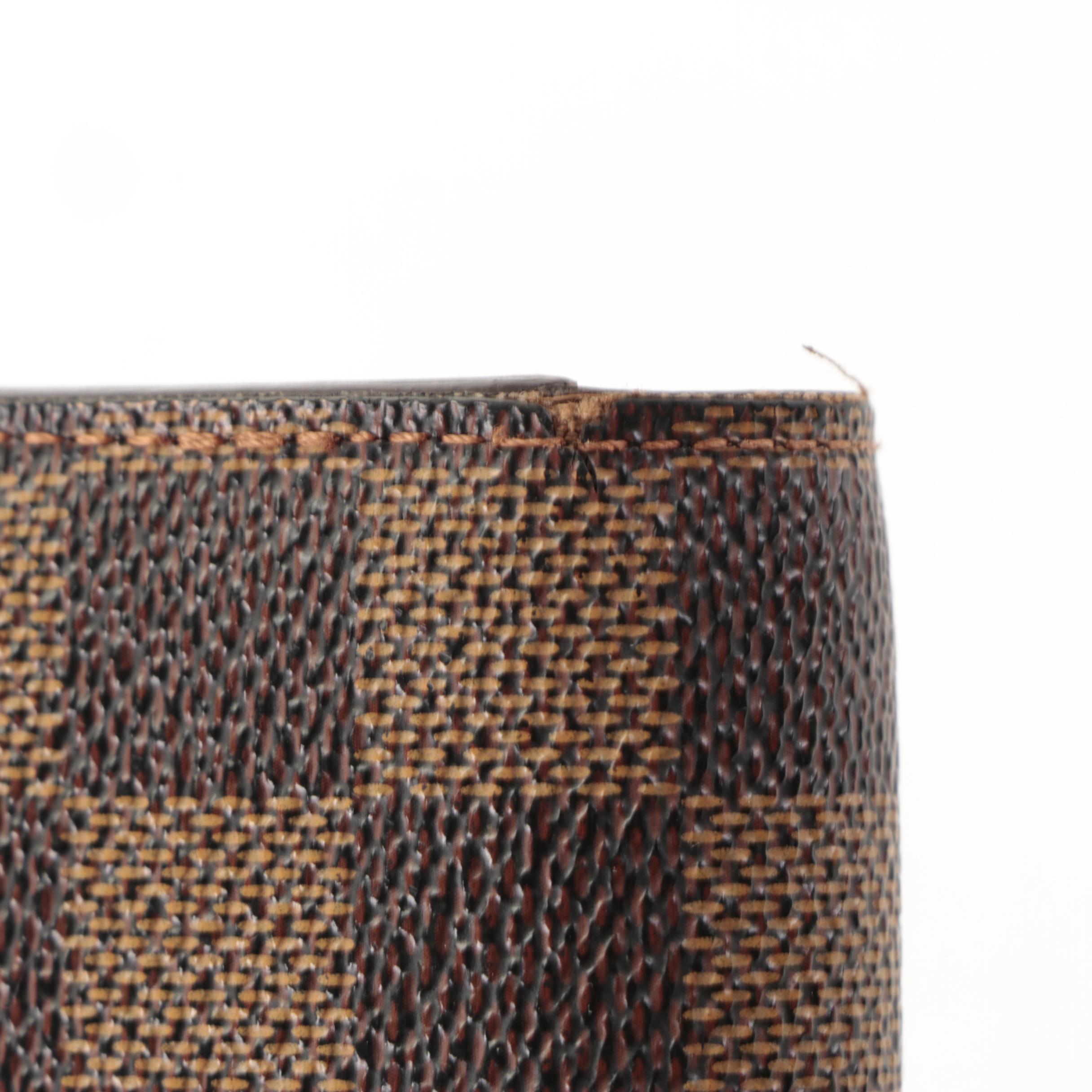 Louis Vuitton Sarah Wallet in Damier Ebene Canvas