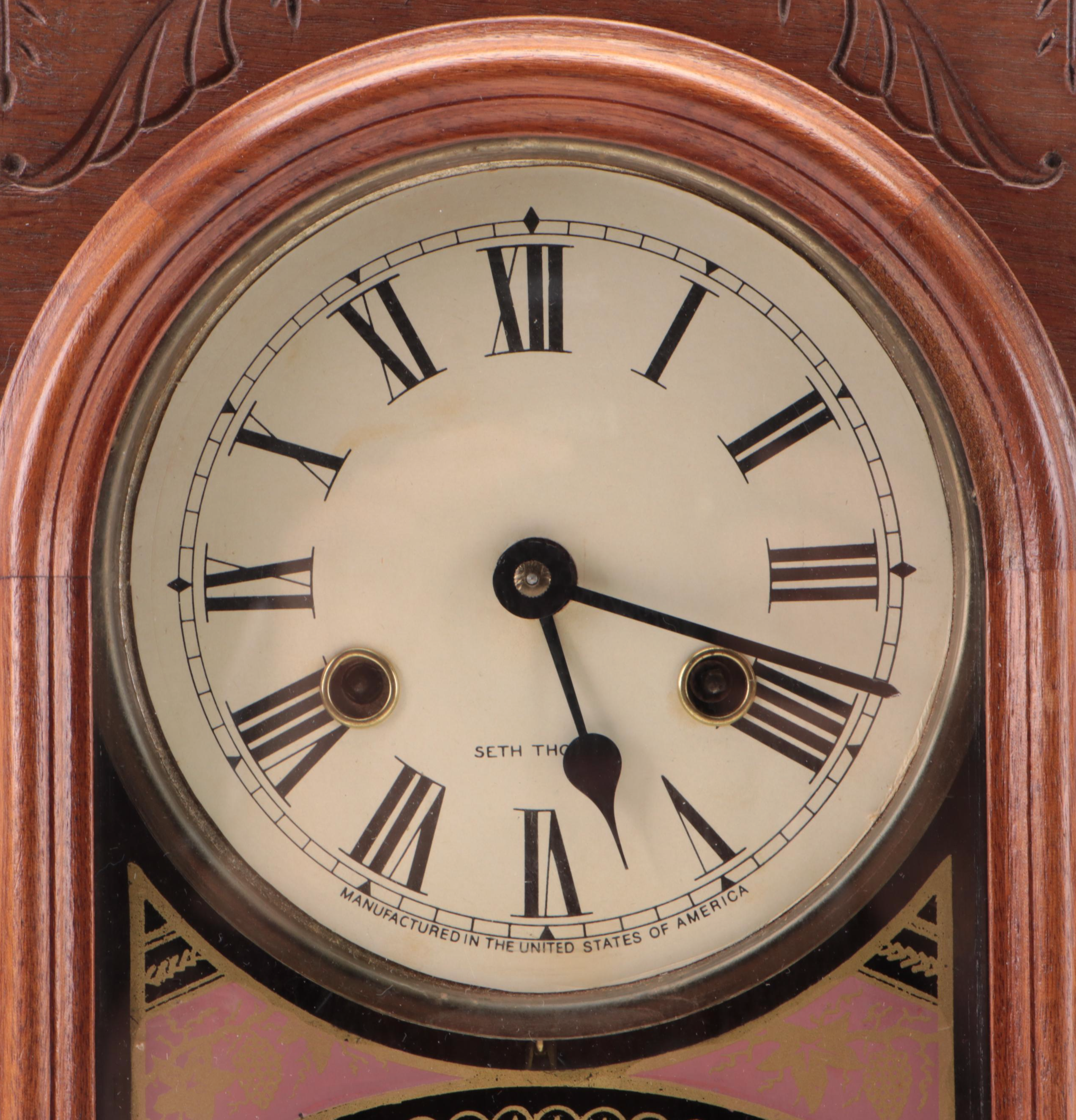 Seth Thomas Clock Co. Pressed Walnut Gingerbread Clock, Late 19th/ Early 20th C.