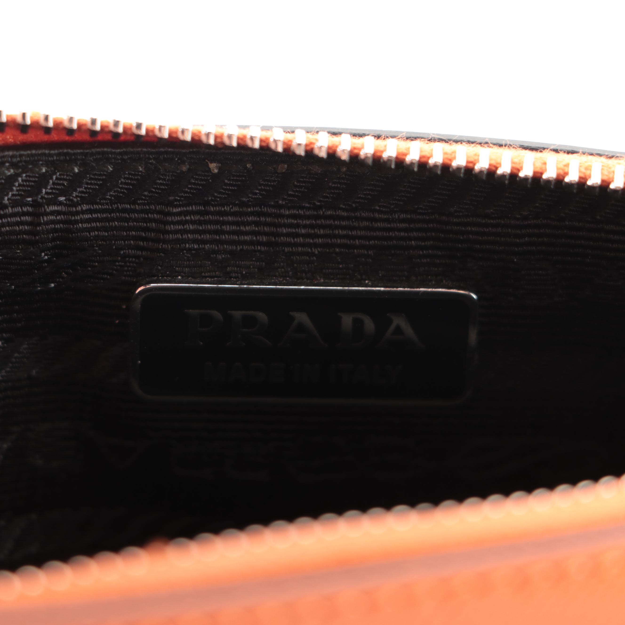 Prada Small Zip Pochette-on-Chain in Orange Saffiano Patent Leather