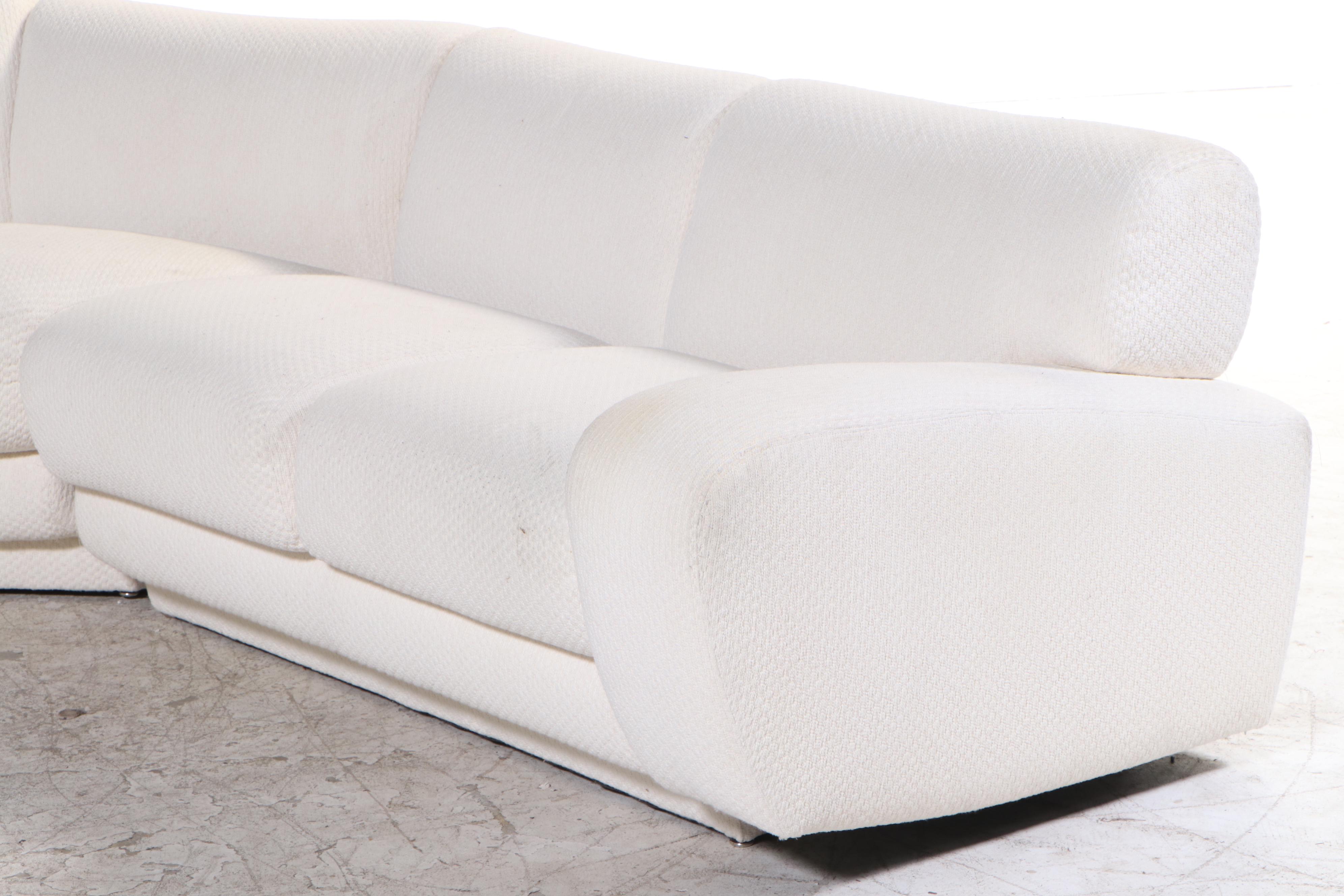 Krispin's Three-Piece Sectional Sofa in Cream Textured Fabric Upholstery