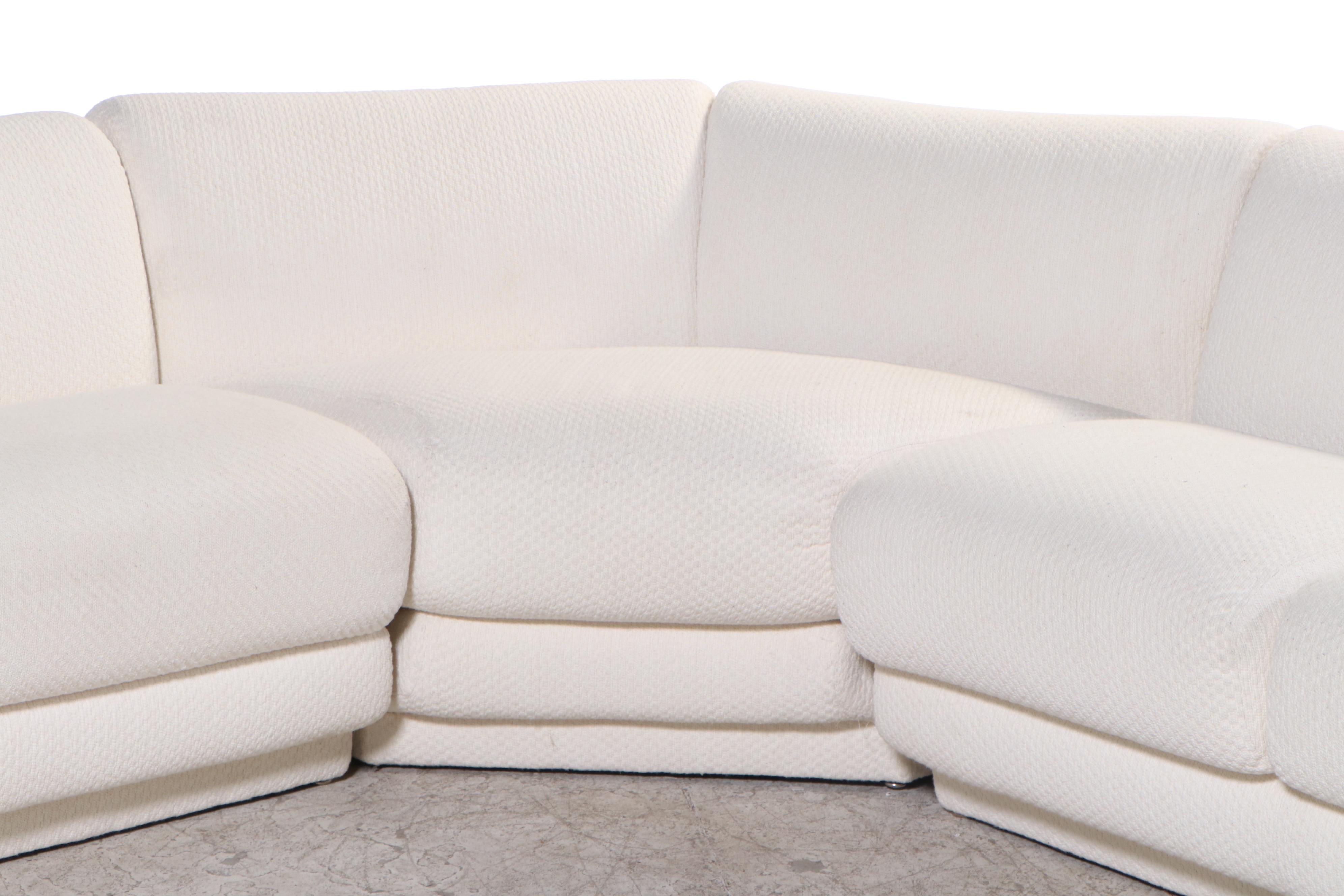 Krispin's Three-Piece Sectional Sofa in Cream Textured Fabric Upholstery