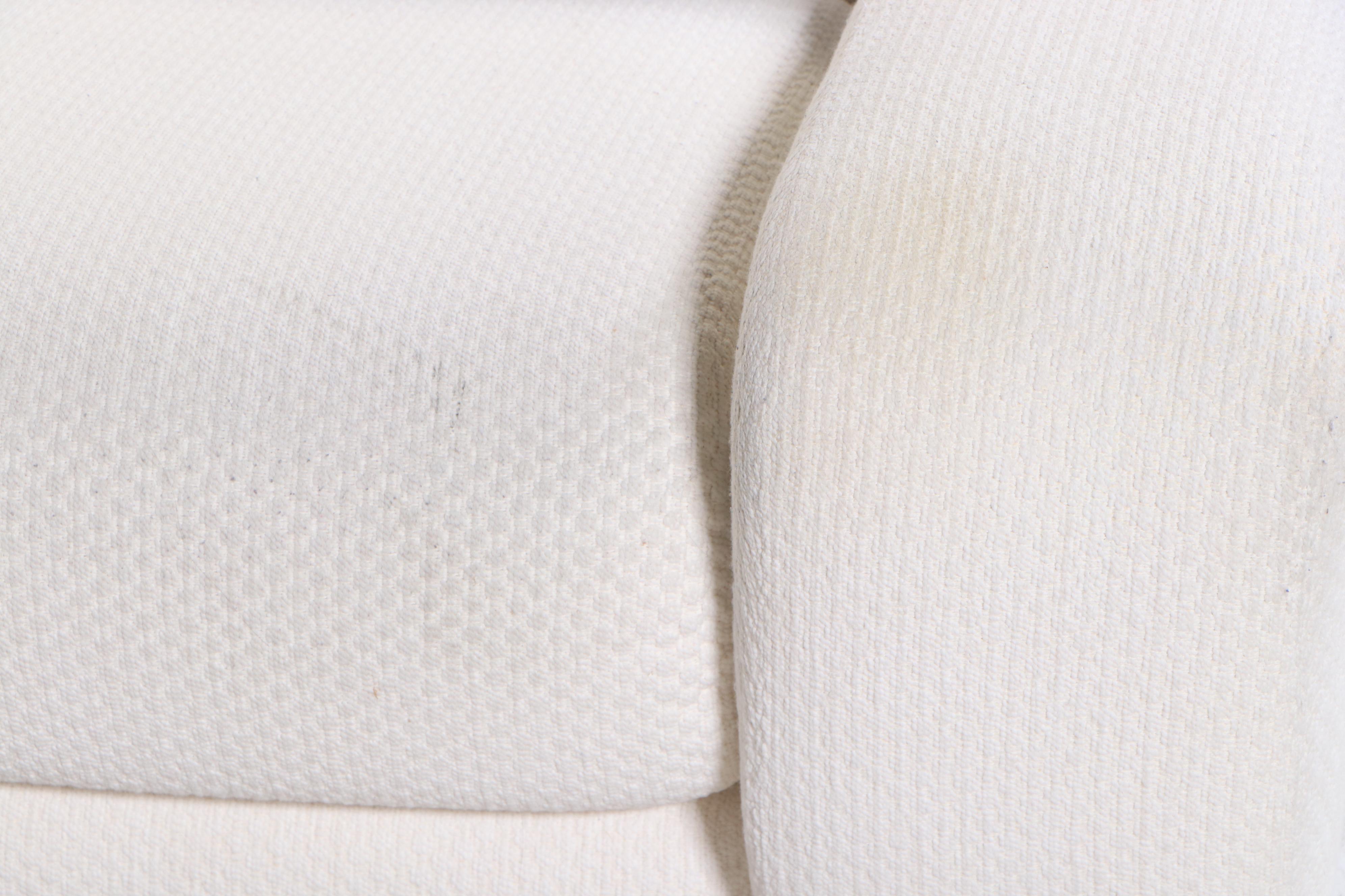 Krispin's Three-Piece Sectional Sofa in Cream Textured Fabric Upholstery