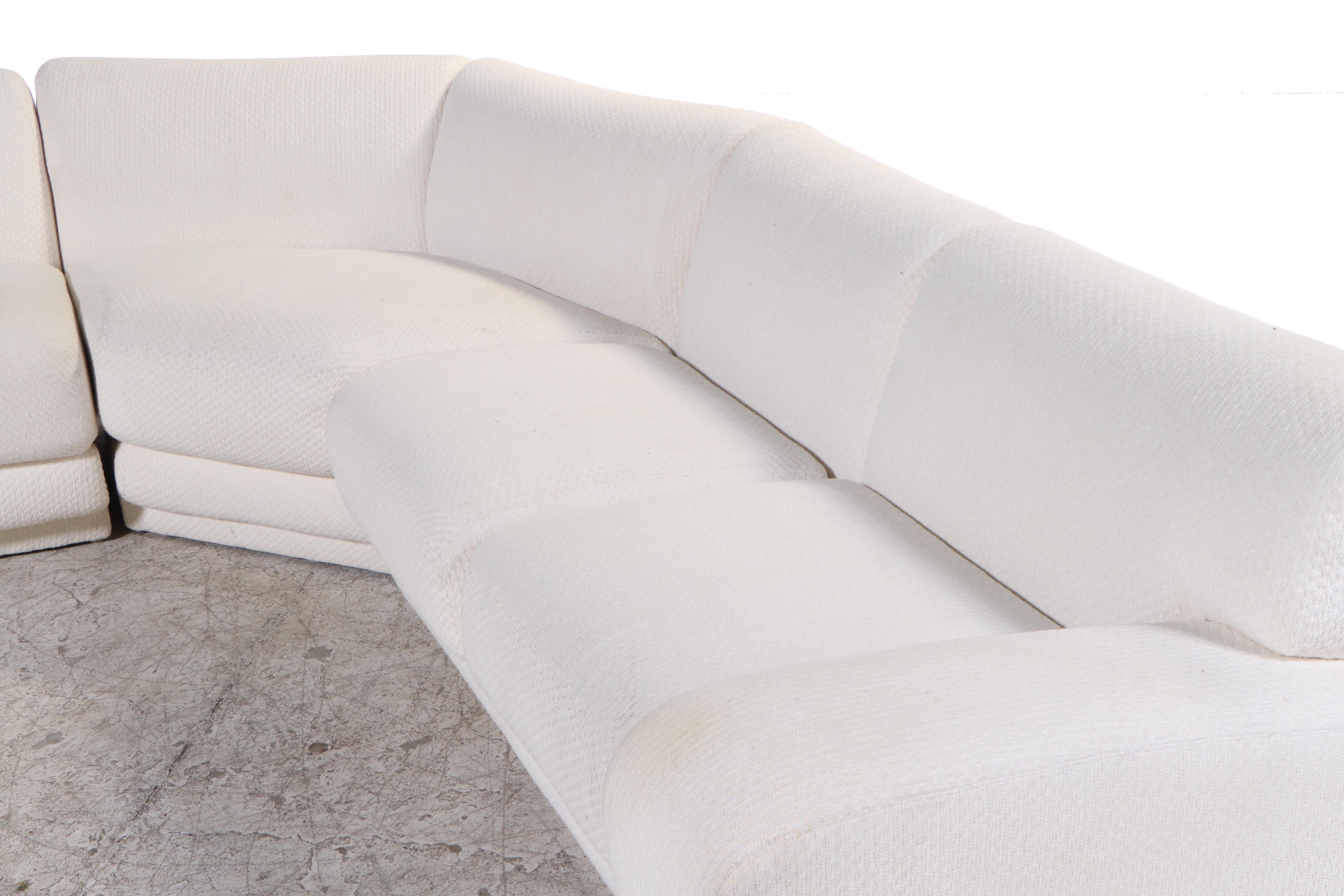 Krispin's Three-Piece Sectional Sofa in Cream Textured Fabric Upholstery