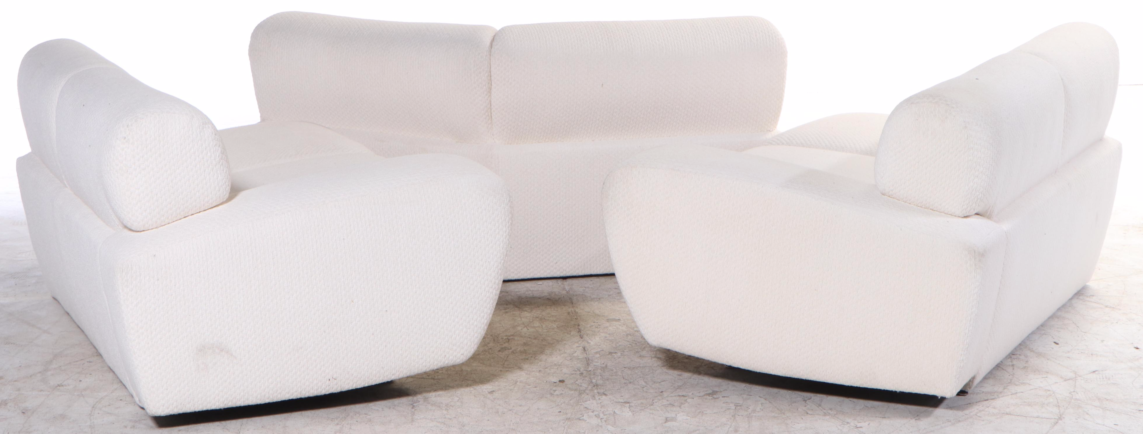 Krispin's Three-Piece Sectional Sofa in Cream Textured Fabric Upholstery