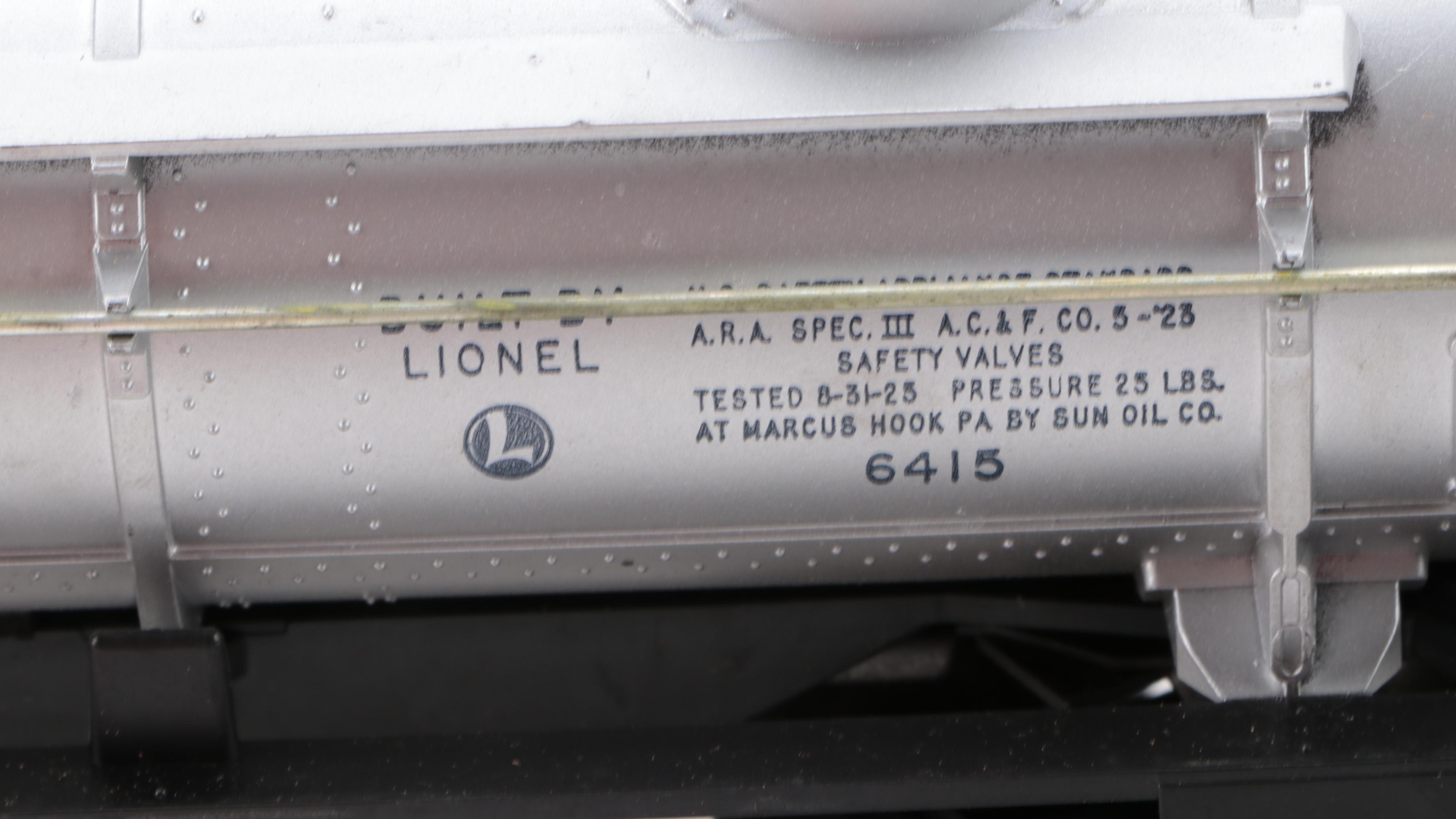 Lionel 675 Locomotive with Lionel O Gauge Freight Cars and Manuals