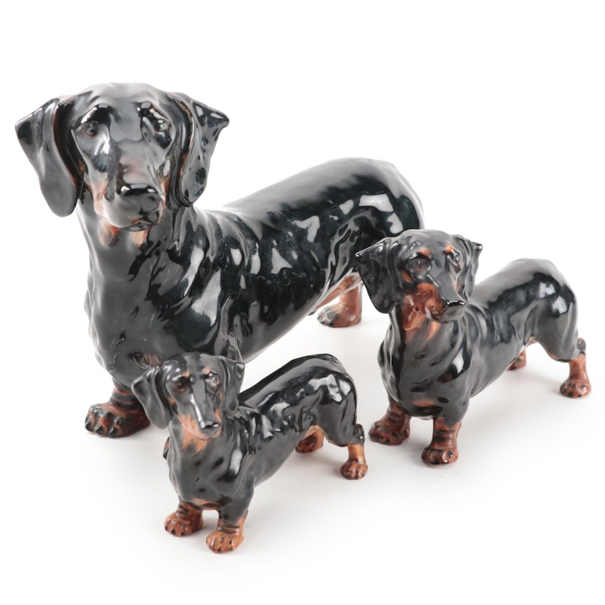 Royal Doulton "Shrewd Saint" and Other Bone China Dachshund Figures