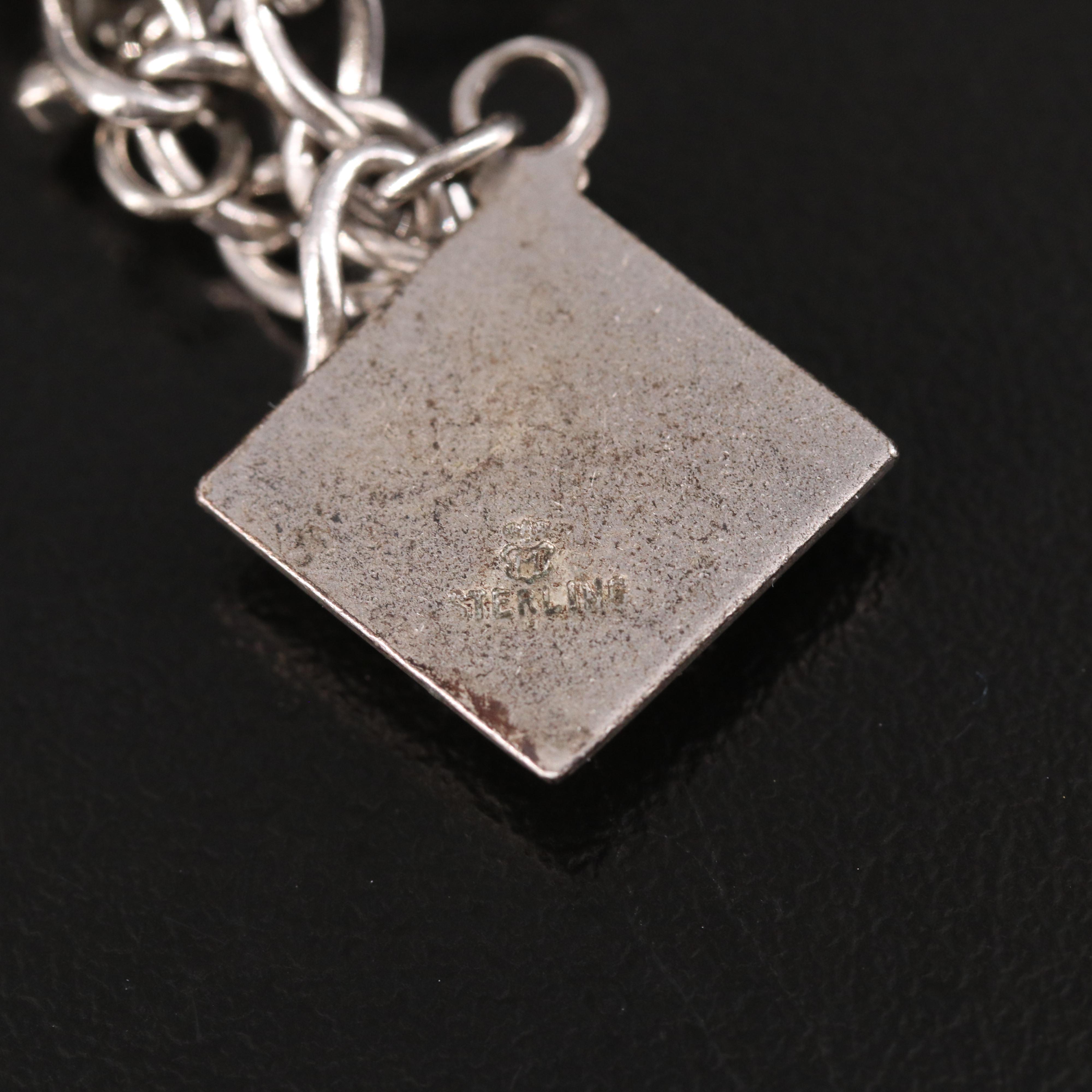 Vintage Sterling Charm Bracelet Featuring Travel Charms