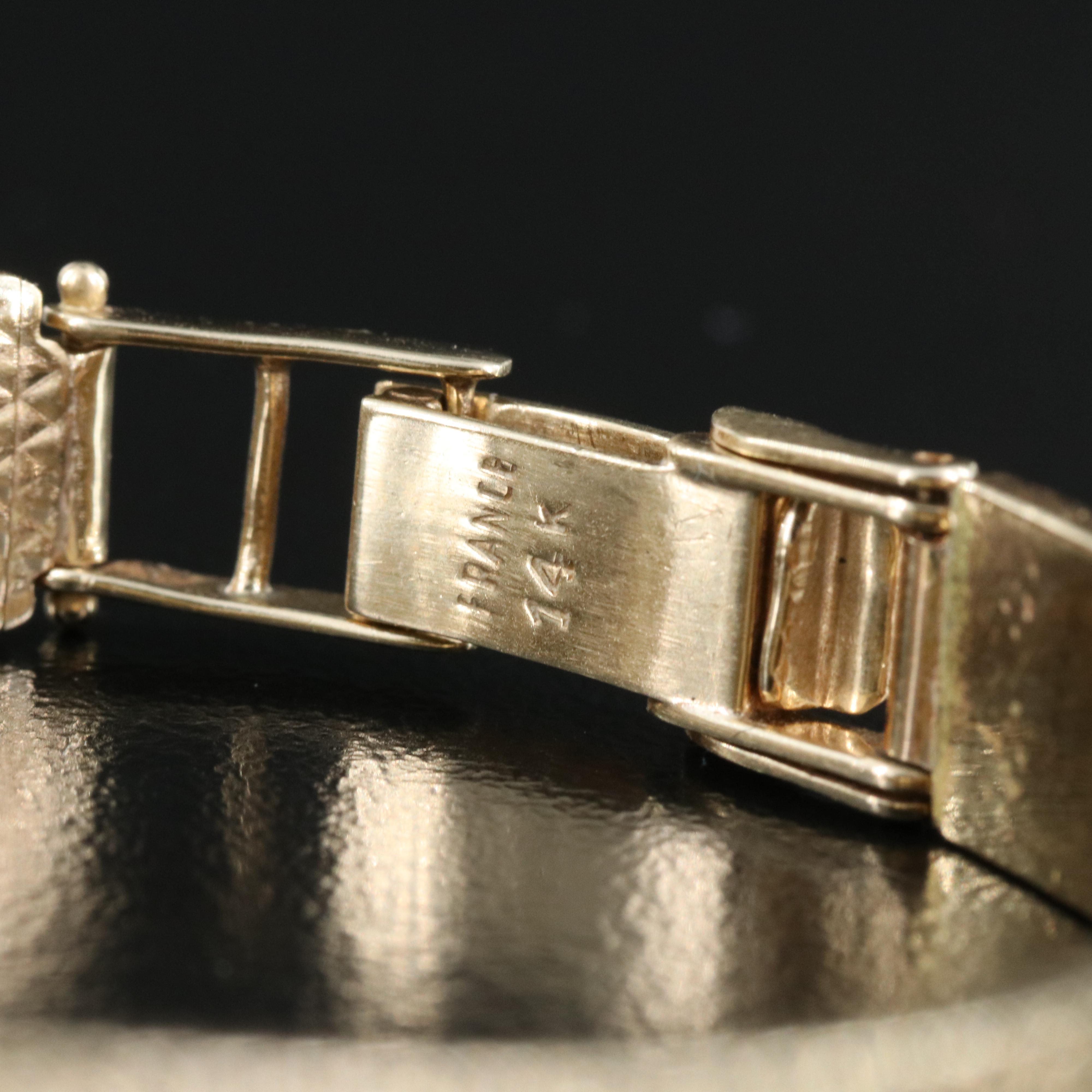 Vintage Rolex 14K and Diamond Watch