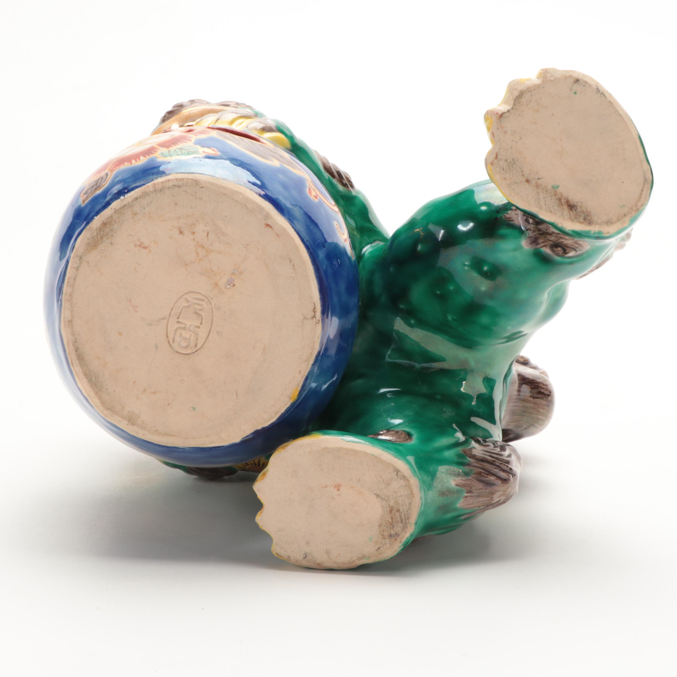 Chinese Porcelain Figurines of Fu Xing, Lu Xing and Earthenware Guardian Lion