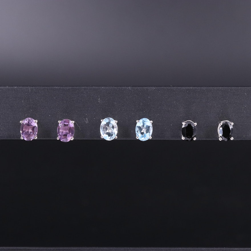 Sterling Silver Stud Earring Trio Including Sapphire, Amethyst, and Aquamarine