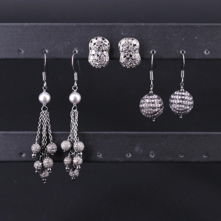 Assortment of Sterling Silver Earrings Including Diamonds