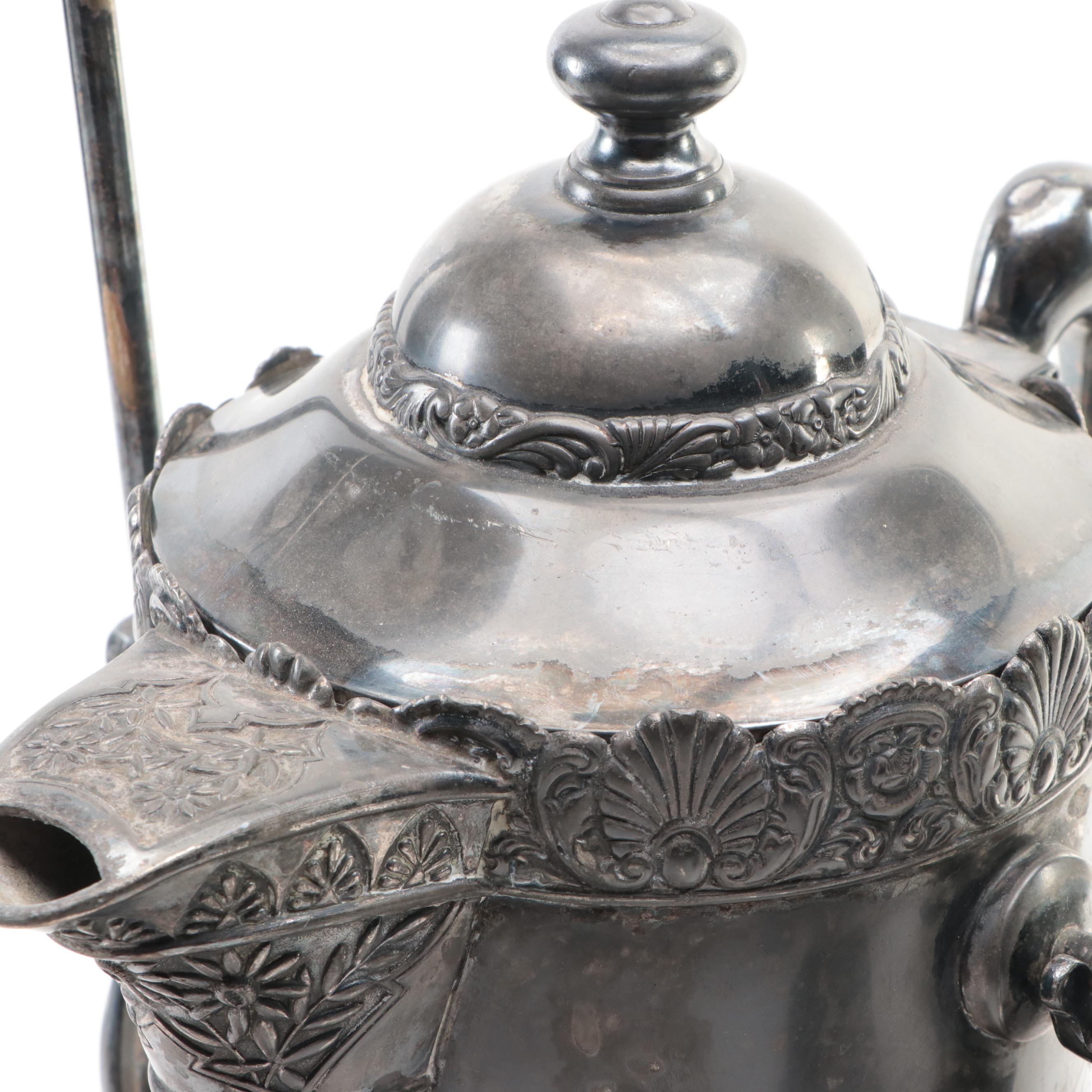 Barbour Silver Co. Tilting Water Pitcher with Other Silver Plate Tableware