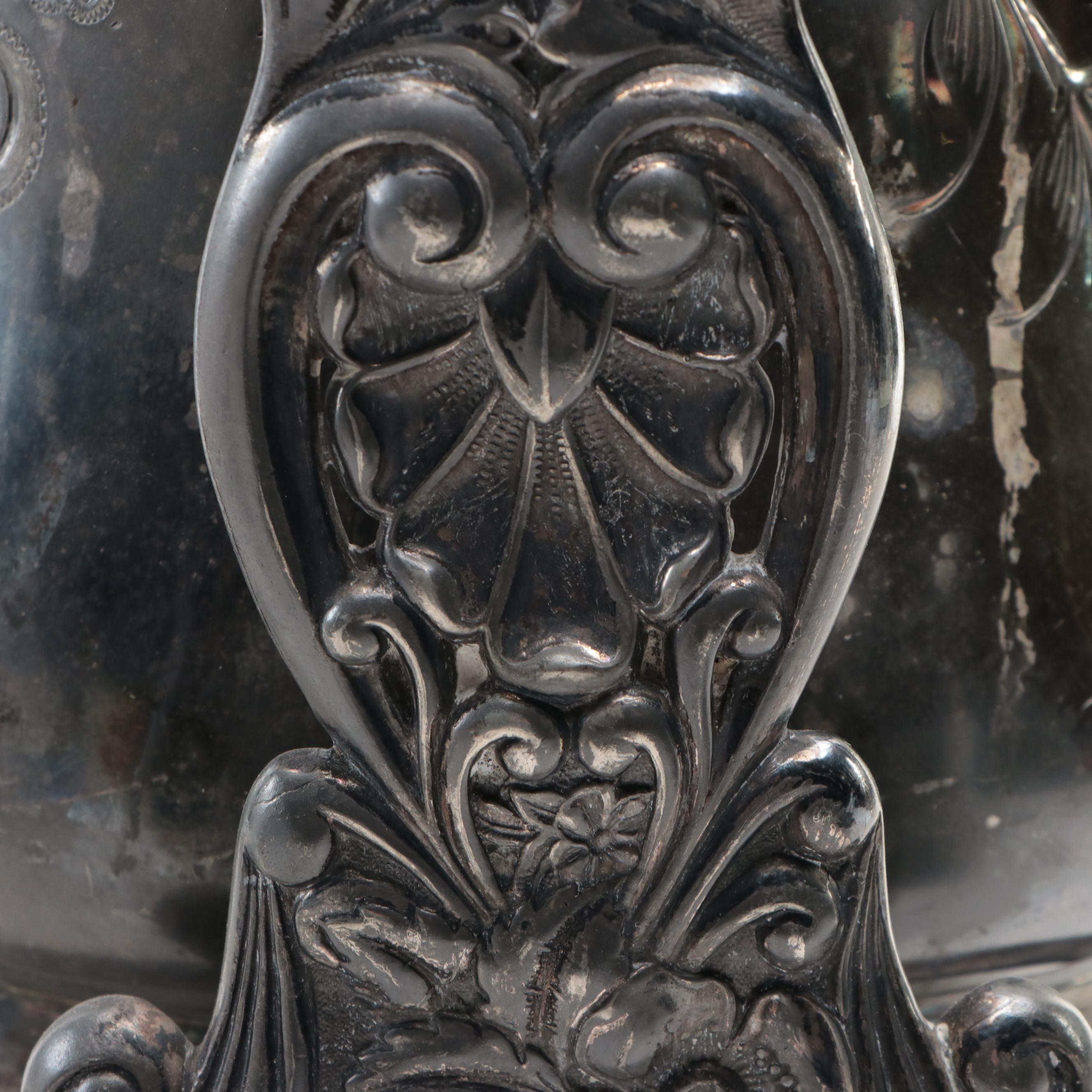 Barbour Silver Co. Tilting Water Pitcher with Other Silver Plate Tableware