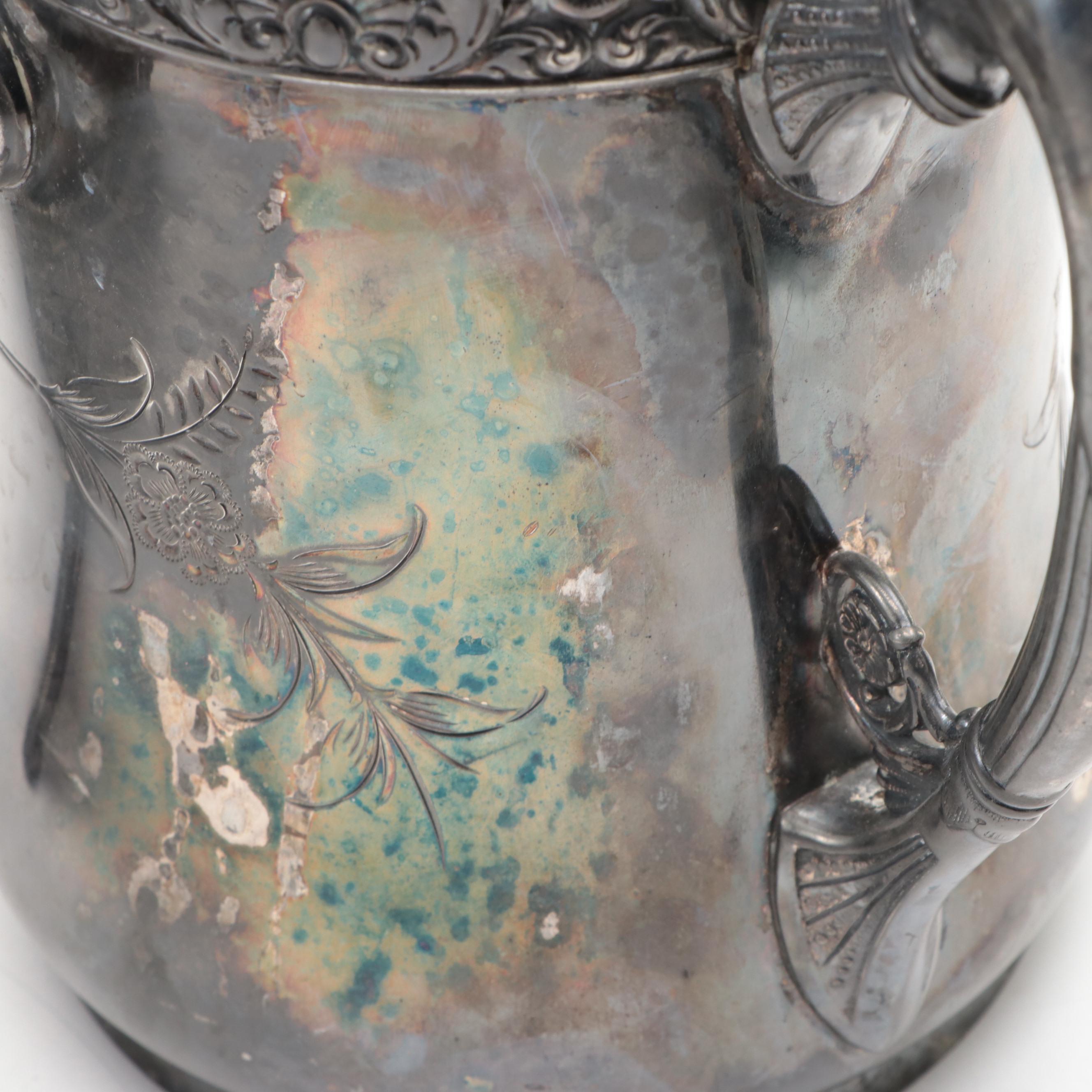 Barbour Silver Co. Tilting Water Pitcher with Other Silver Plate Tableware