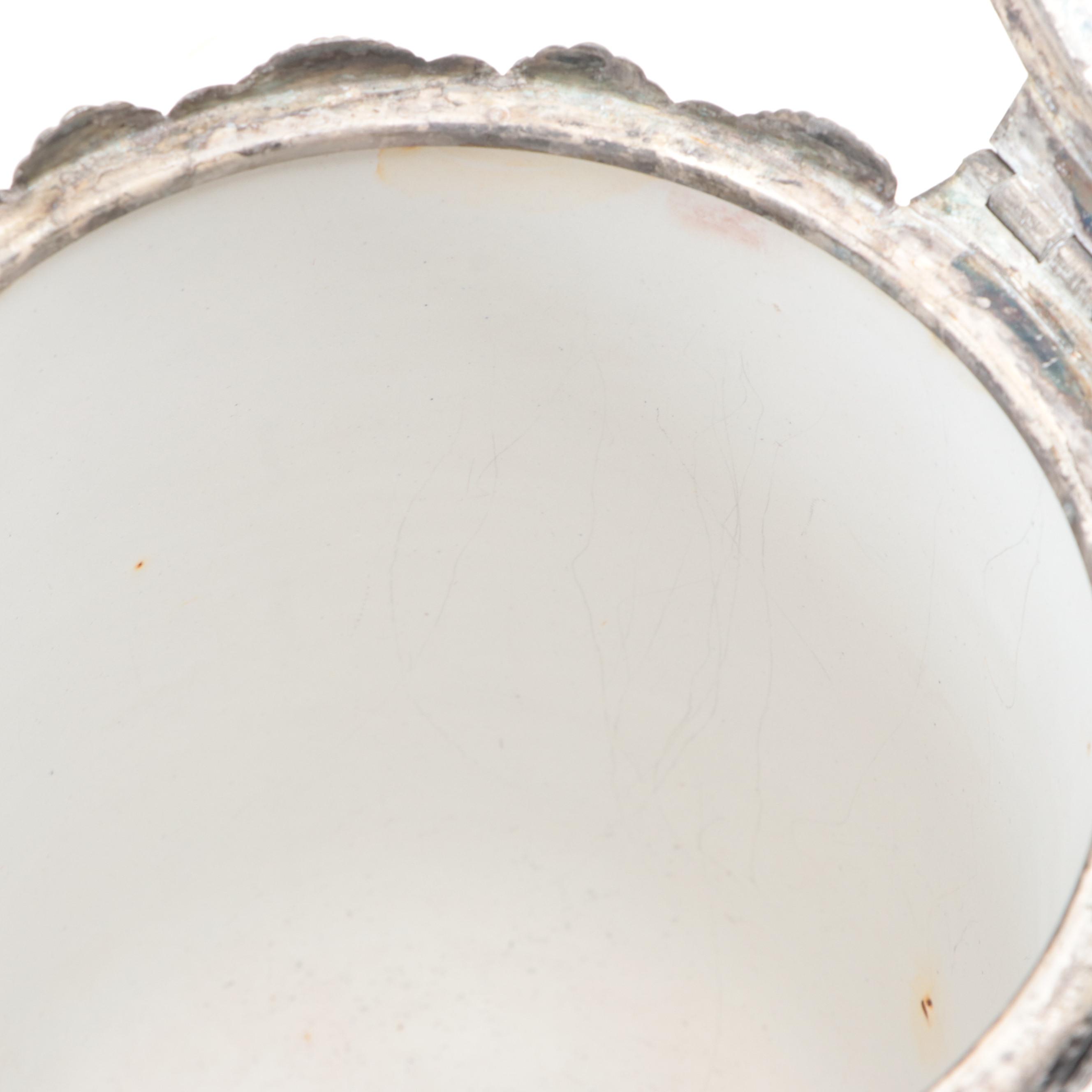 Barbour Silver Co. Tilting Water Pitcher with Other Silver Plate Tableware