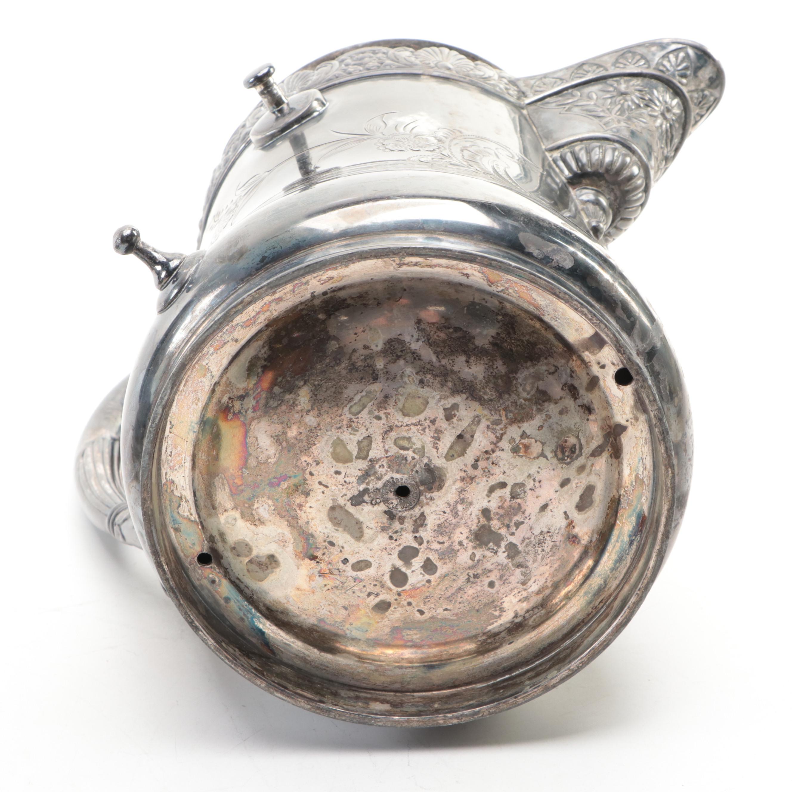 Barbour Silver Co. Tilting Water Pitcher with Other Silver Plate Tableware