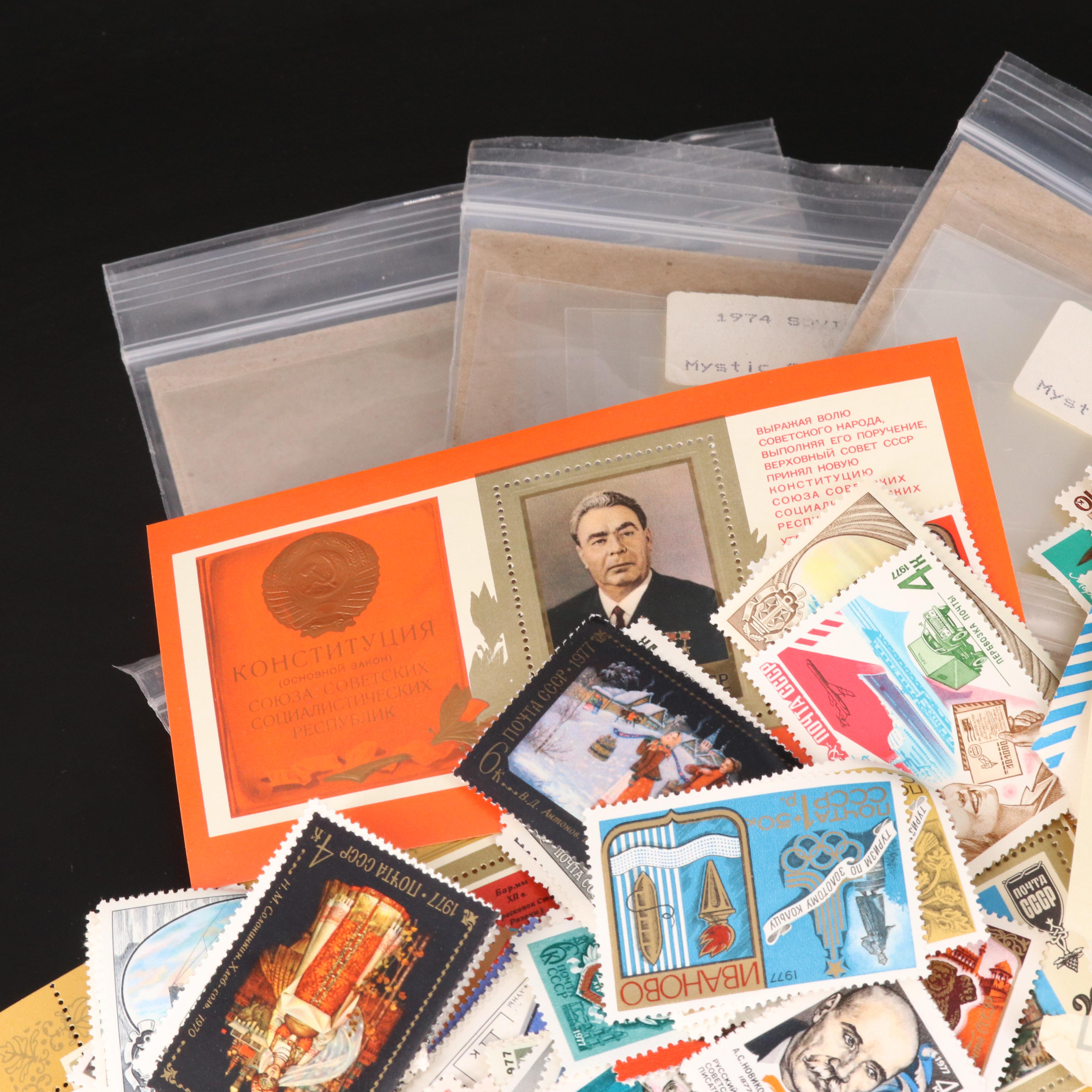 Assortment of Stamp Mounts and Soviet Union Postage Stamps