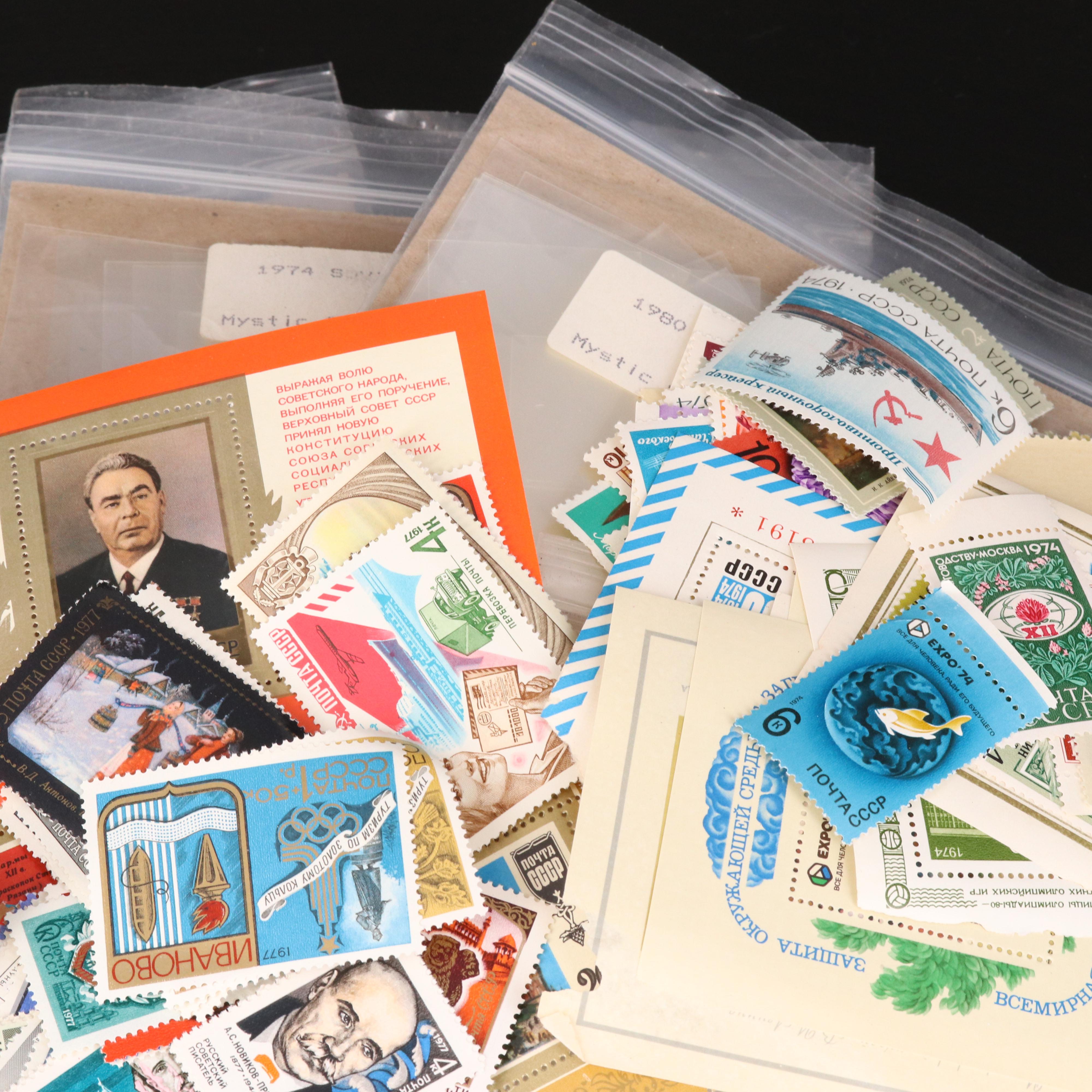 Assortment of Stamp Mounts and Soviet Union Postage Stamps