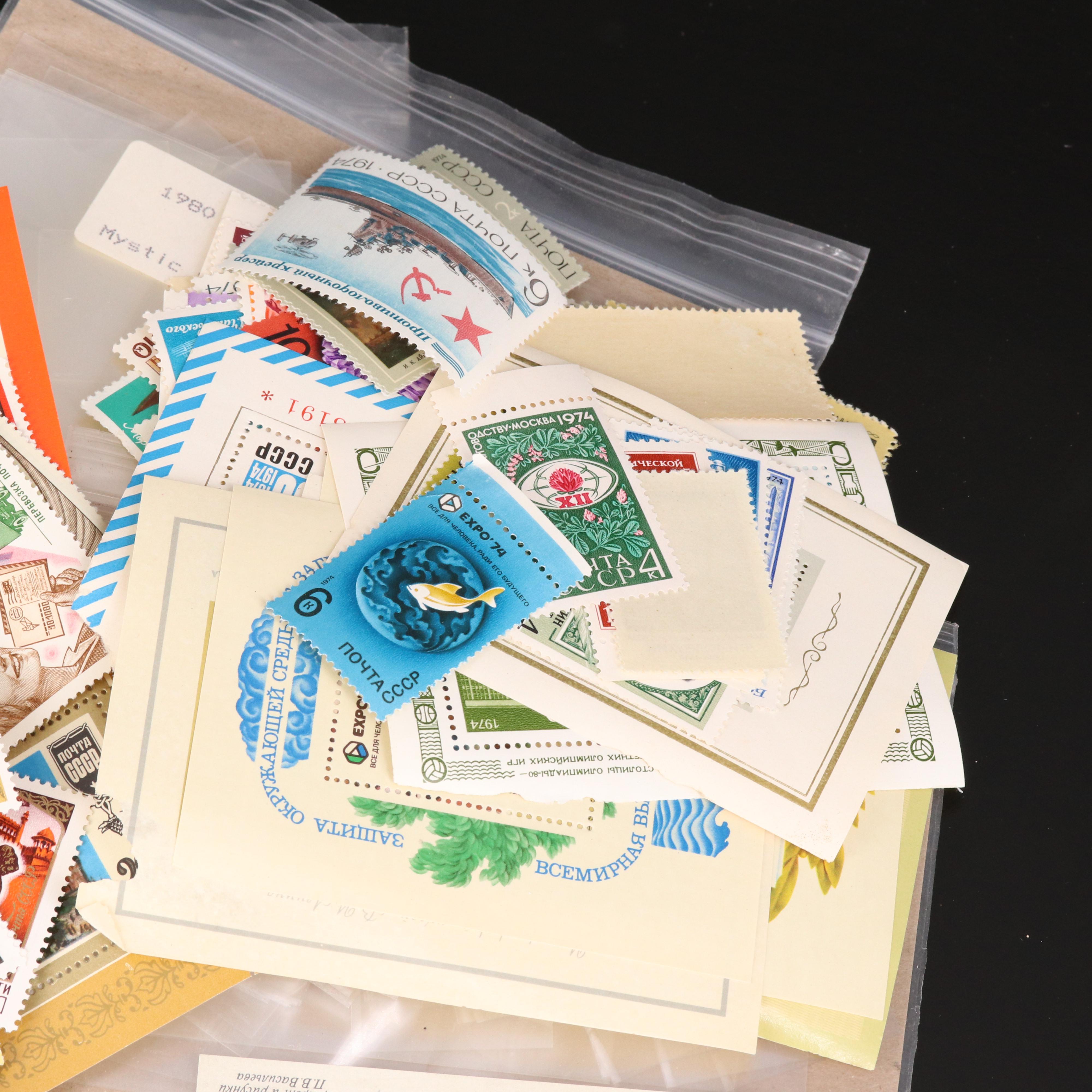 Assortment of Stamp Mounts and Soviet Union Postage Stamps