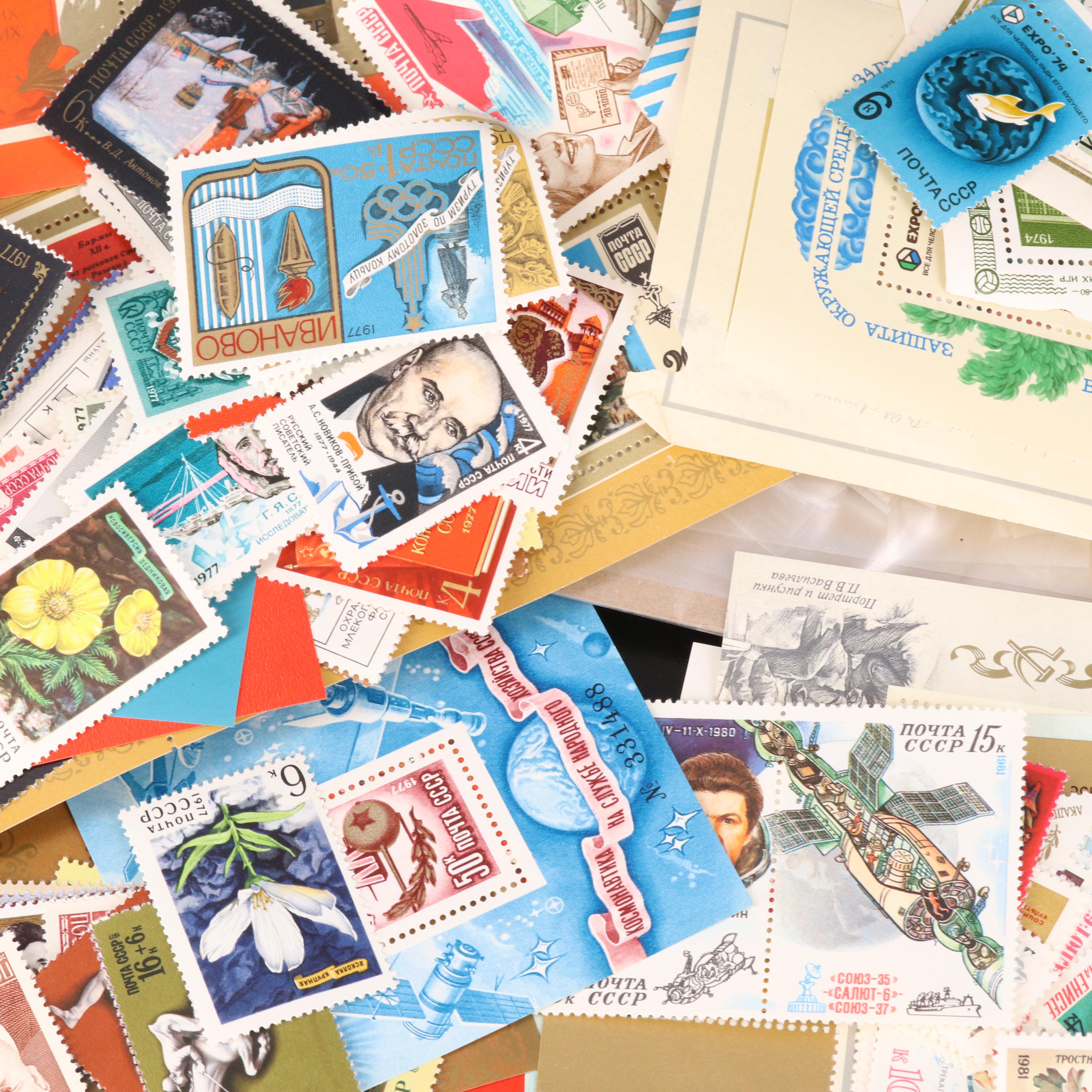 Assortment of Stamp Mounts and Soviet Union Postage Stamps