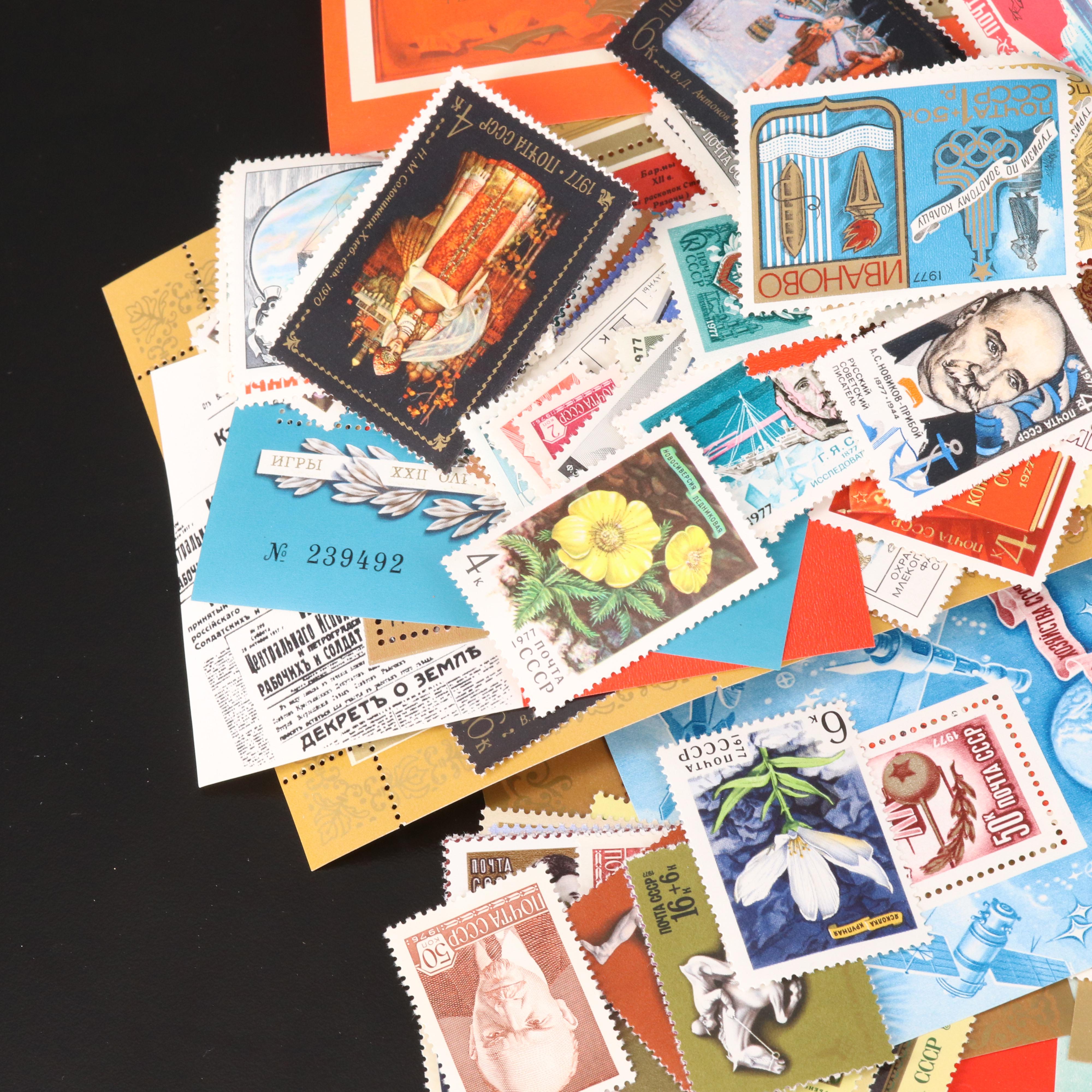 Assortment of Stamp Mounts and Soviet Union Postage Stamps