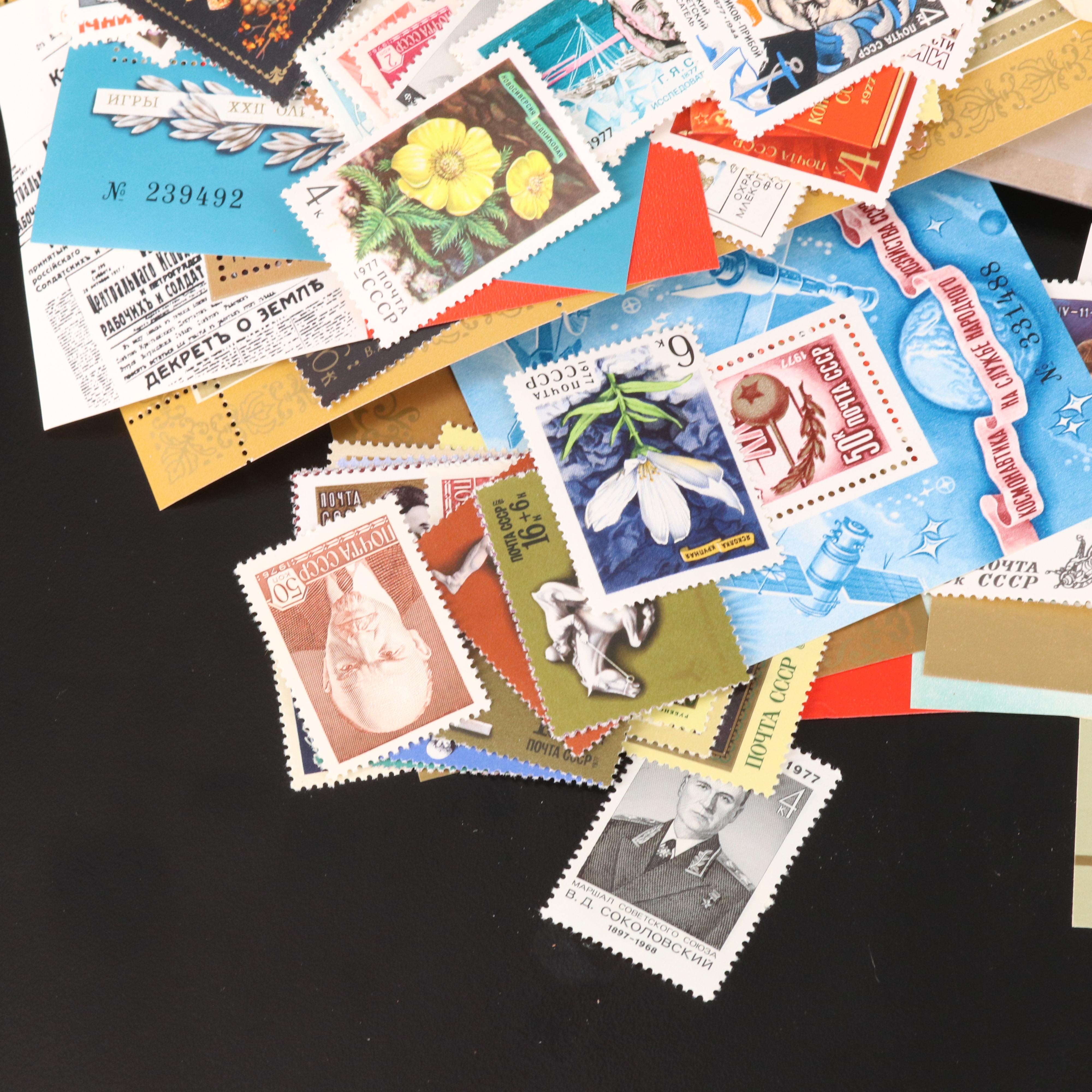 Assortment of Stamp Mounts and Soviet Union Postage Stamps